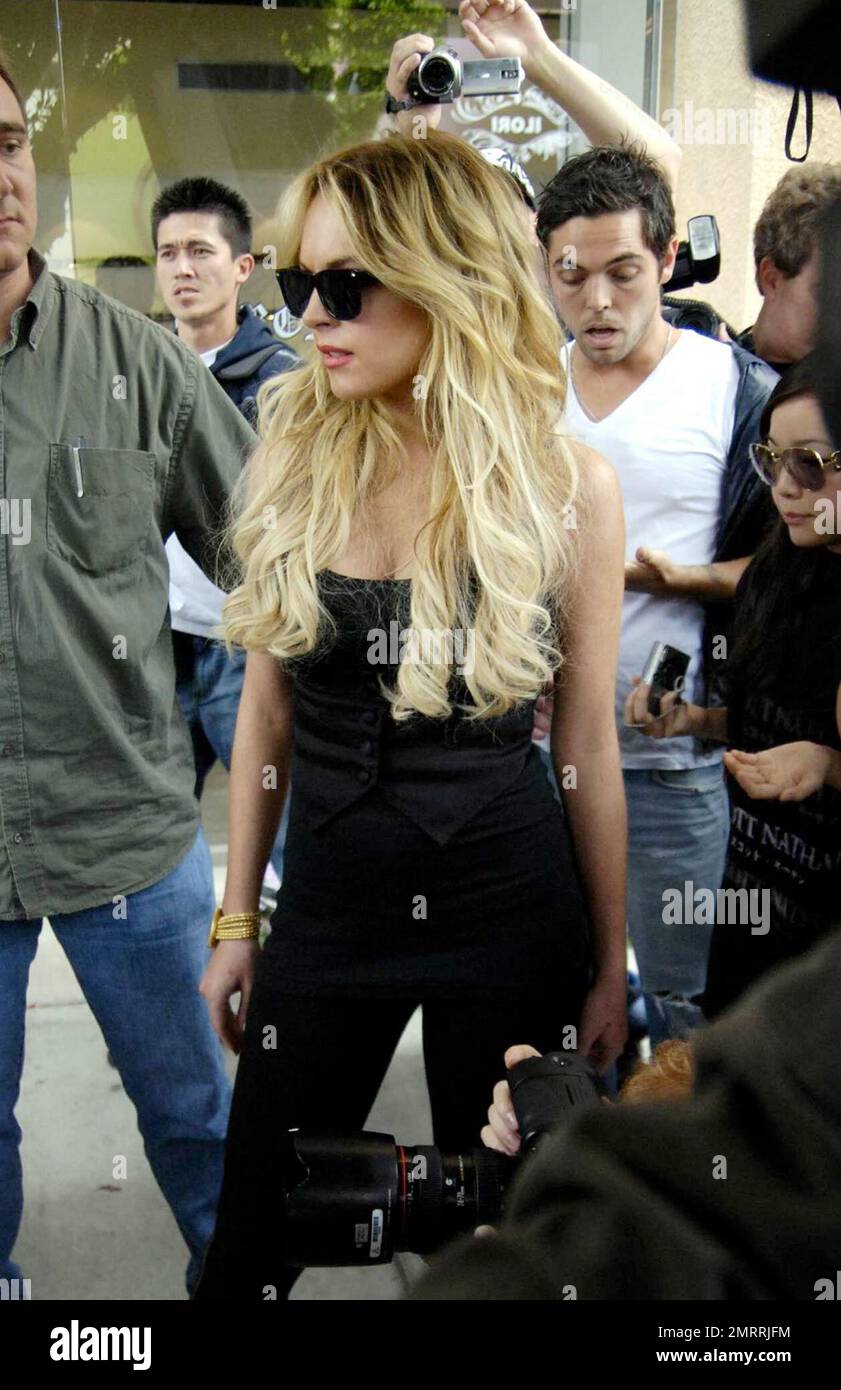 Lindsay Lohan held part two of a fashion shoot for her soon to be released 6126 clothing line on Robertson Blvd. this afternoon. 6126 is Marilyn Monroe s birthday. The shoot featured Lindsay leggings ...