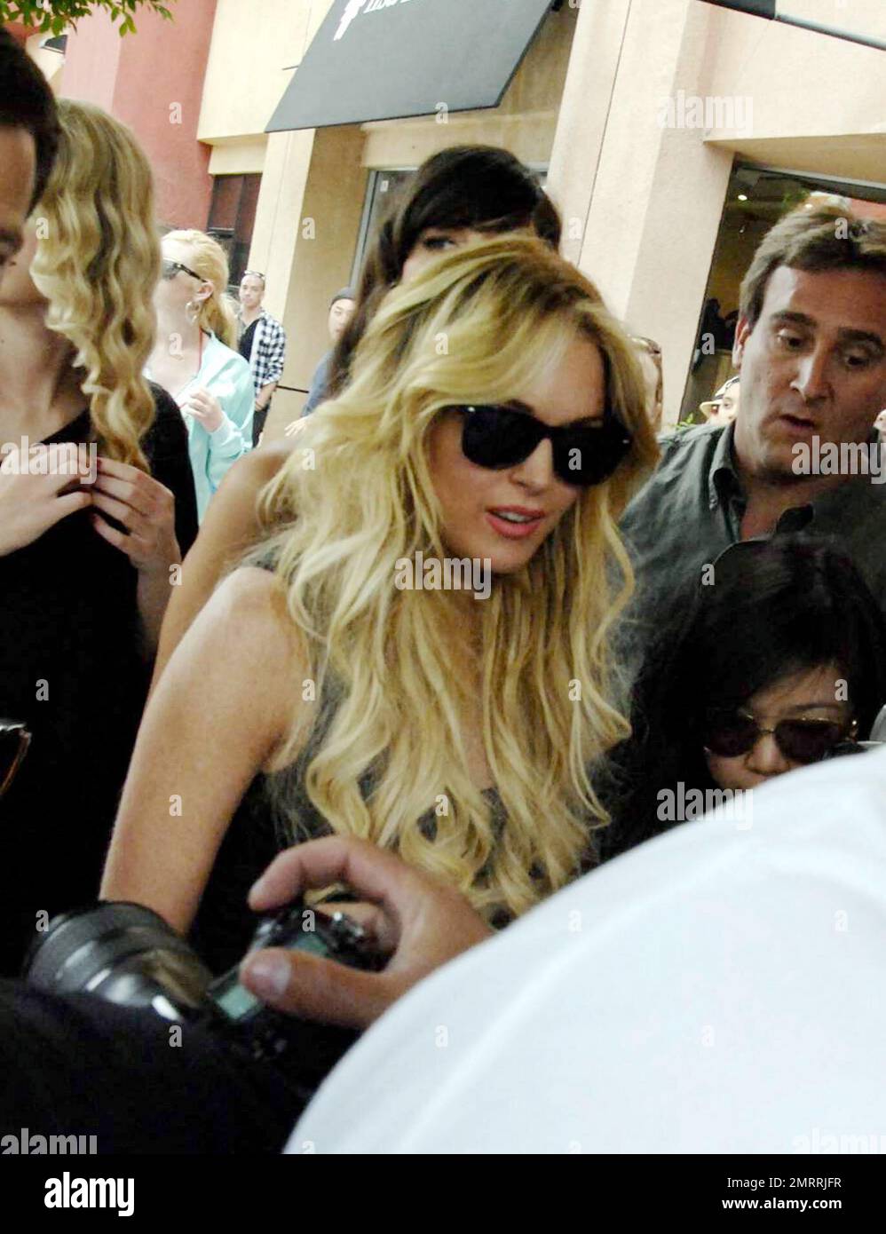 Lindsay Lohan held part two of a fashion shoot for her soontobe