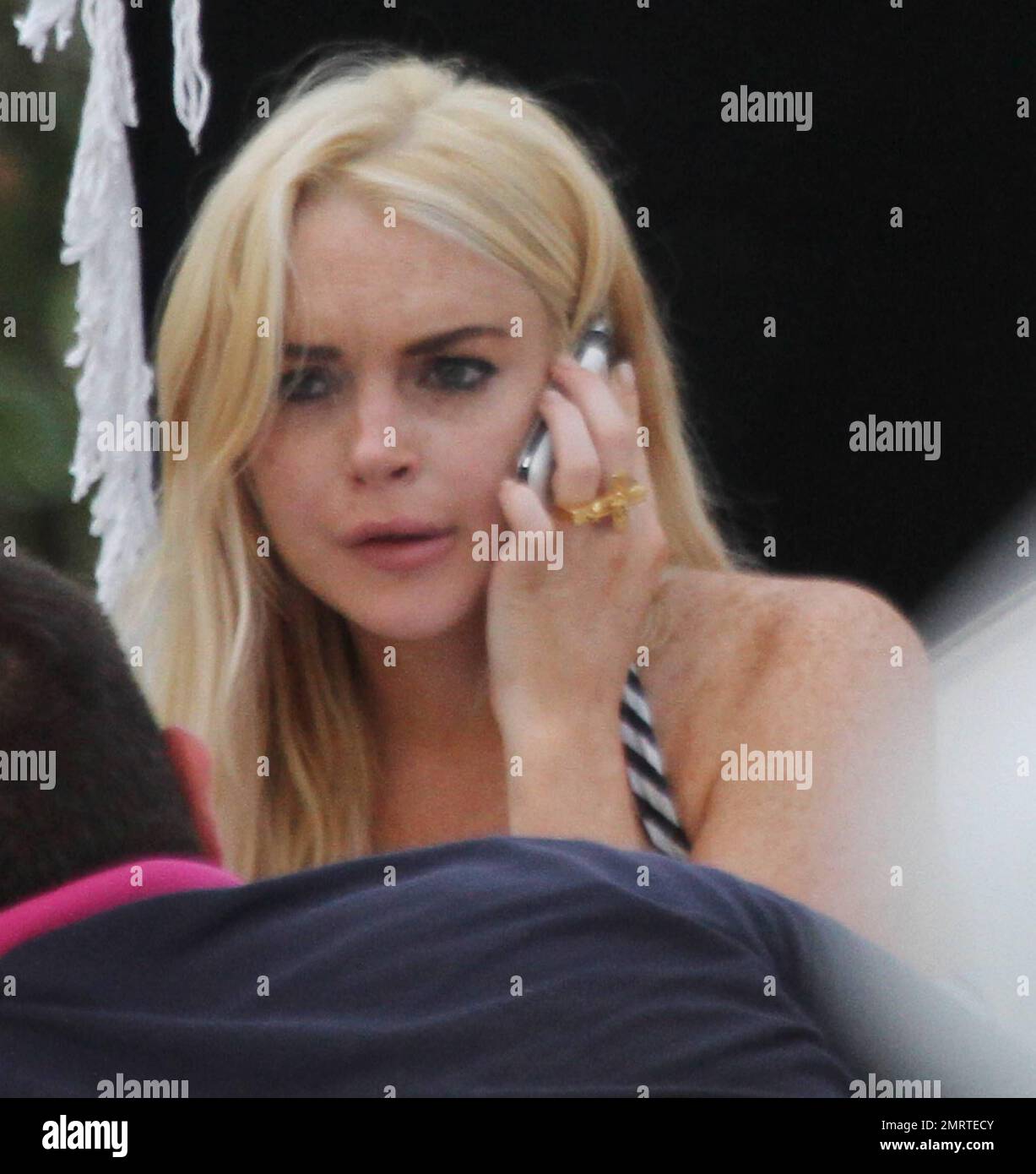 EXCLUSIVE!! Lindsay Lohan appeared to be crying following a phone call