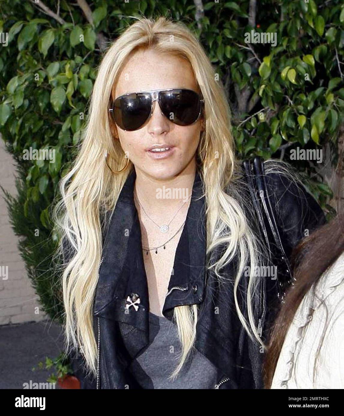 Lindsay Lohan was spotted with Coke today! Coca Cola that is! The actress was snapped leaving the Italian restaurant La Scala holding a can of full-sugar Coca Cola. Beverly Hills, CA. 12/17/07. Stock Photo