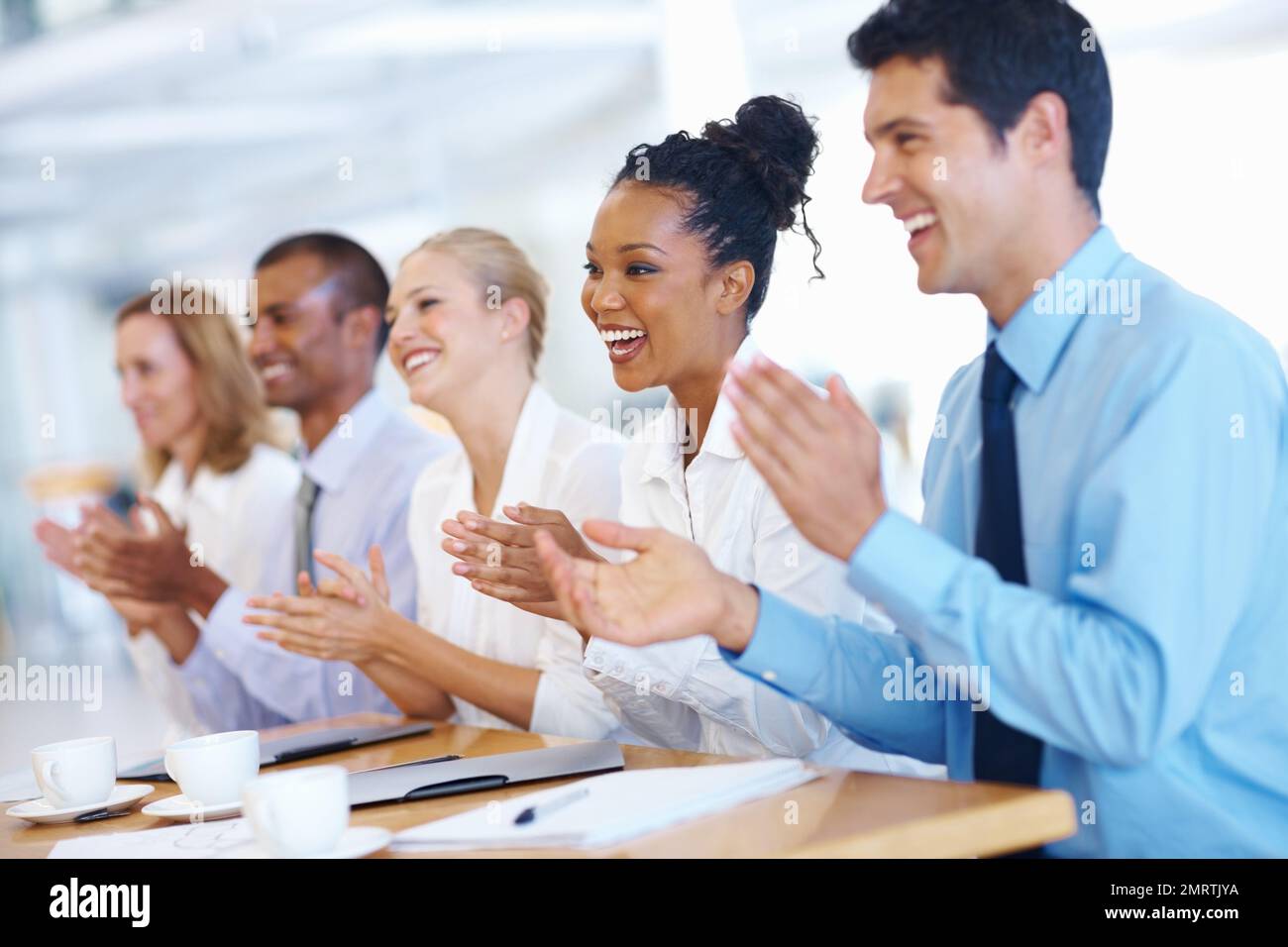 Well done. Portrait of supportive business team appreciating after presentation. Stock Photo