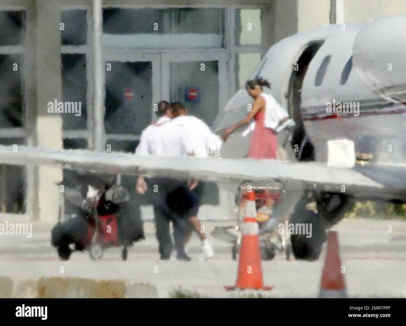 Newlyweds, Eva Longoria and Tony Parker, arrive at Miami International