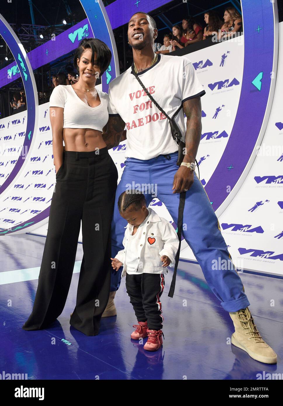 Teyana Taylor, left, Iman Shumpert, right, and their daughter Iman