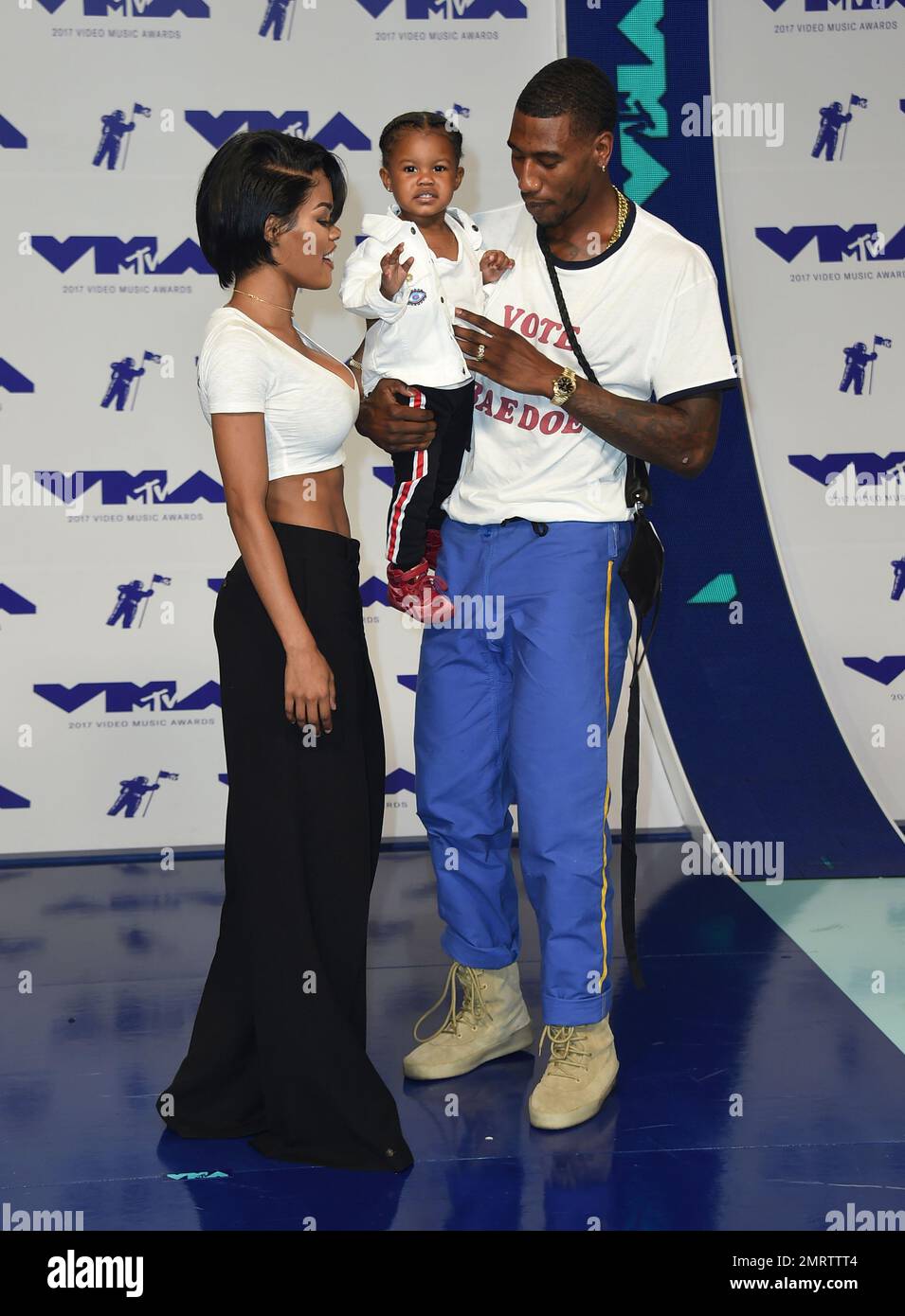 Teyana Taylor, left, Iman Shumpert, right, and their daughter Iman arrive  at the MTV Video Music Awards at The Forum on Sunday, Aug. 27, 2017, in  Inglewood, Calif. (Photo by Jordan Strauss/Invision/AP