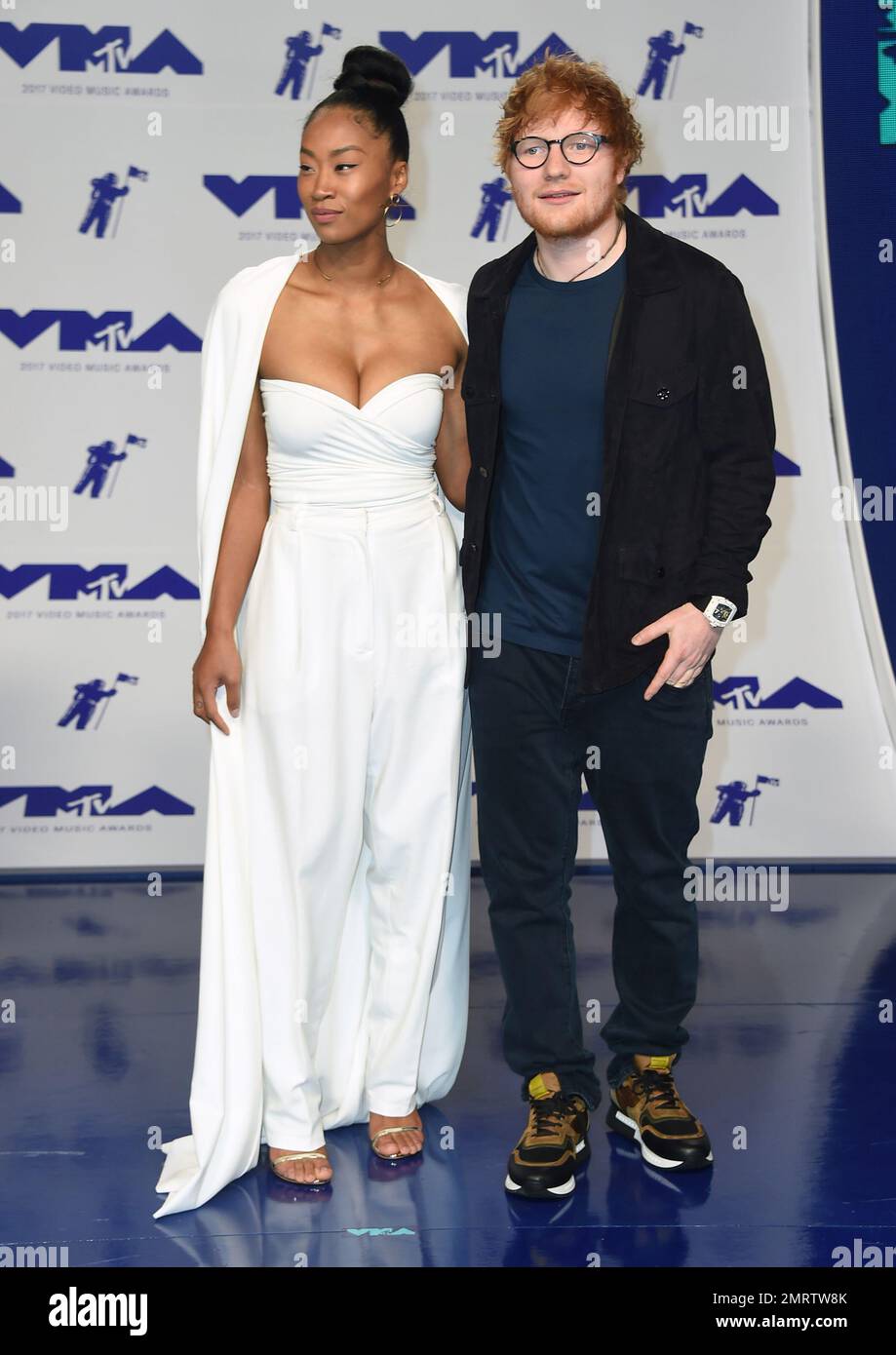 Jennie Pegouskie, left, and Ed Sheeran arrive at the MTV Video Music