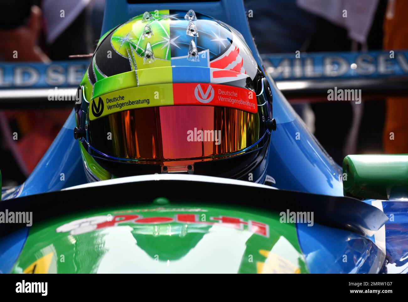 Mick Schumacher, son of seven-time F1 world champion Michael Schumacher,  sits in his car prior to an exhibition lap ahead of the Belgian Formula One  Grand Prix in Spa-Francorchamps, Belgium, Sunday, Aug.
