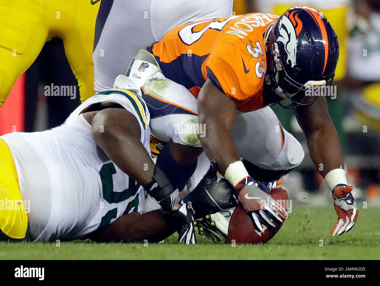 Christian Ringo Nfl Green Bay Packers defensive end Christian Ringo (99) forces Denver ...