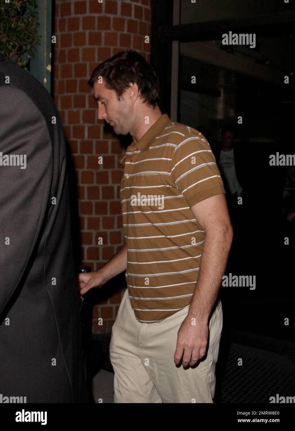Luke Wilson leaves the restaurant Mr. Chow after having dinner and sitting for a bit with Steve Tisch and his daughter. He does his best to keep his head down and completely covers up once in the waiting SUV. Could Luke have been meeting Tisch about being cast in an upcoming film? Los Angeles, CA. 9/24/08. Stock Photo