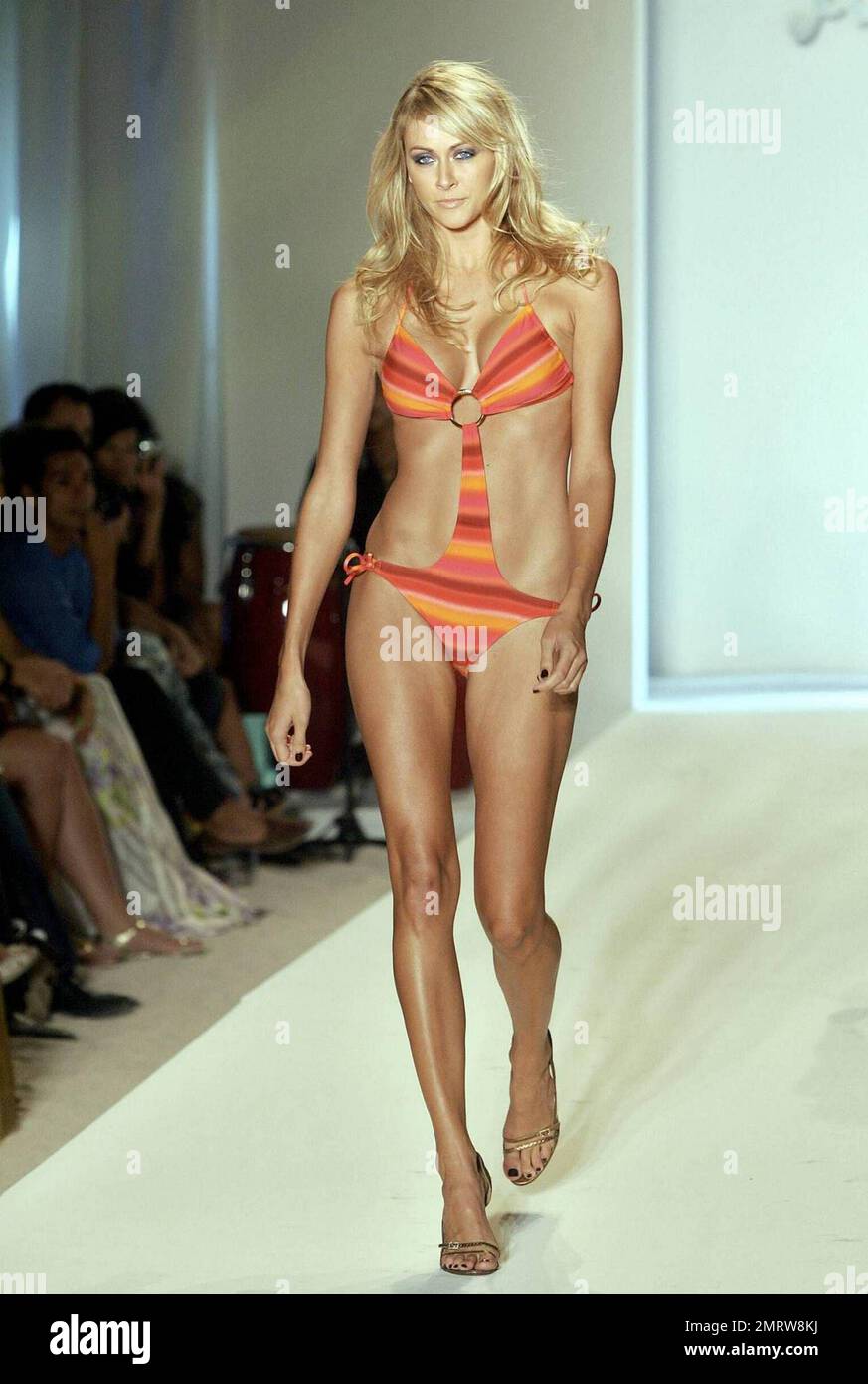 A model walks down the runway during the Luli Fama show at the  Mercedes-Benz Fashion Week Swim 2011 in Miami Beach, Fla. Sunday, July 18,  2010. (AP Photo/Lynne Sladky Stock Photo - Alamy