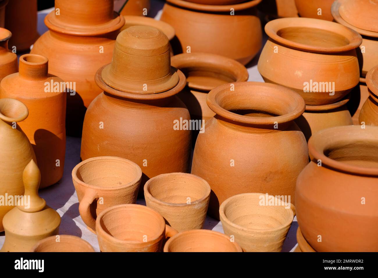 Terracotta, pot, cup kitchen souvenirs pile at street handicraft