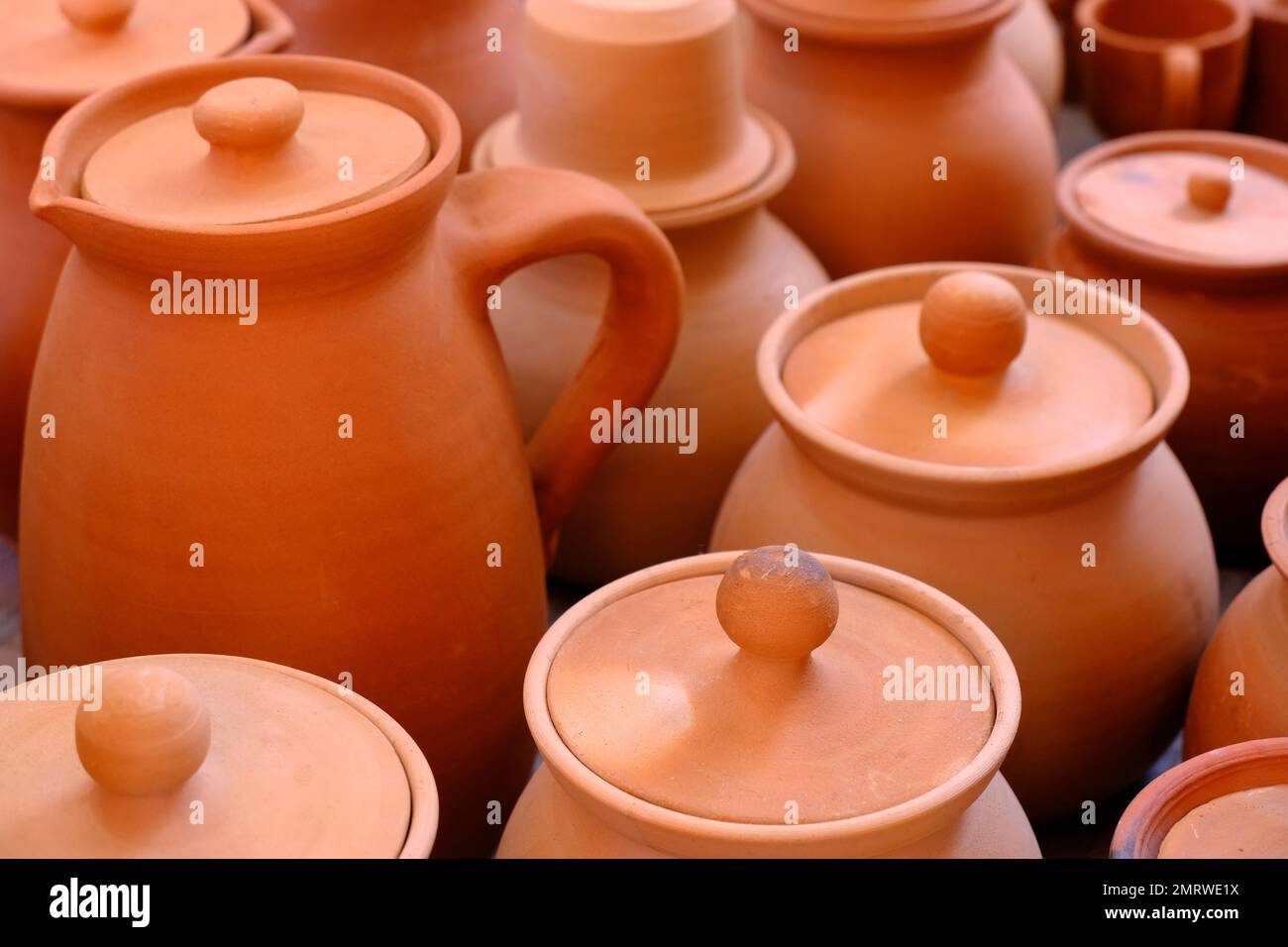 Terracotta, pot, cup kitchen souvenirs pile at street handicraft