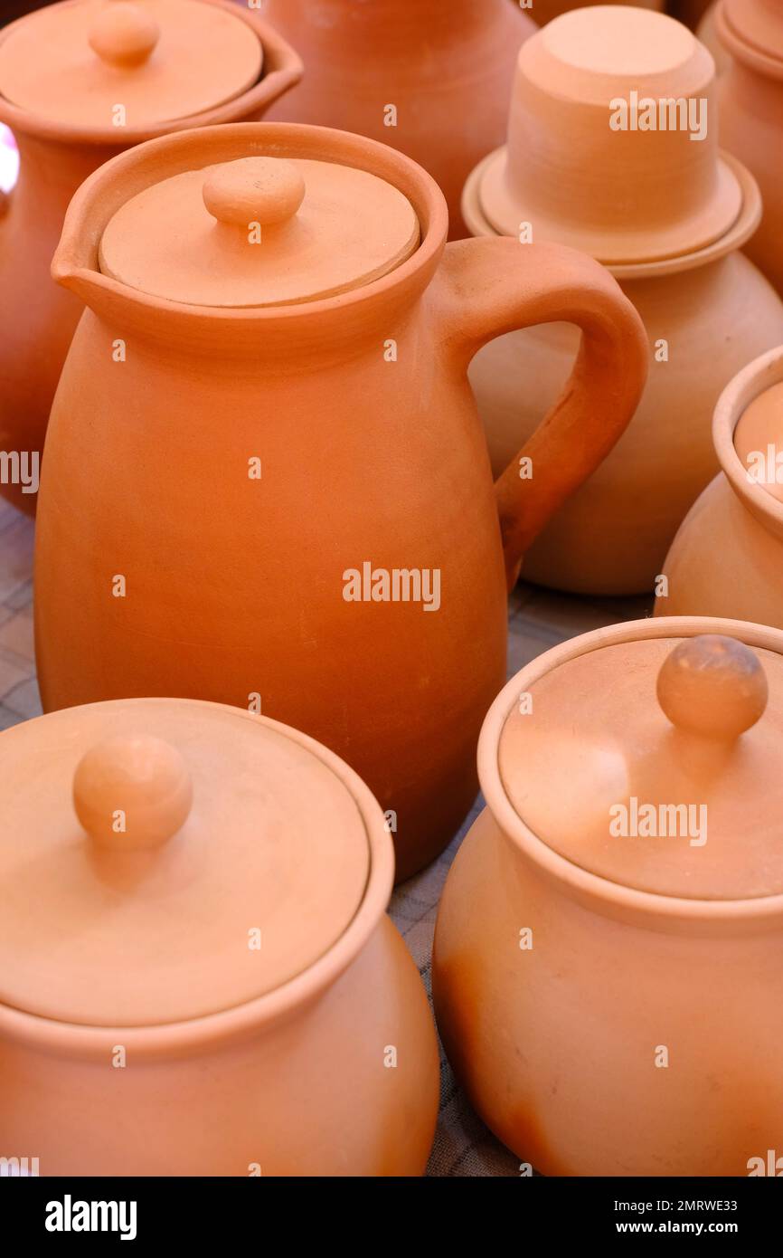 Terracotta, pot, cup kitchen souvenirs pile at street handicraft