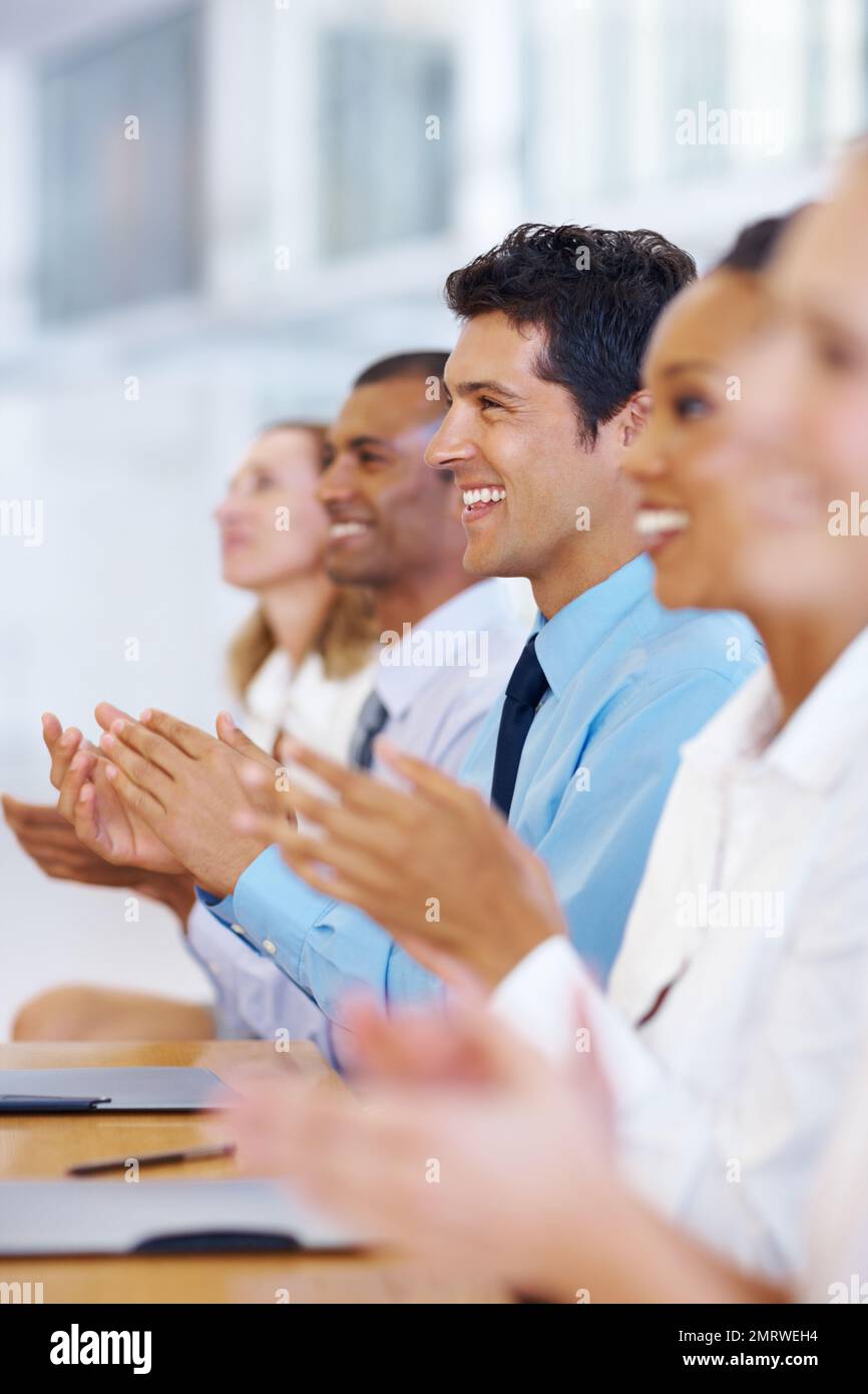 Business applause. Portrait of supportive business group clapping together after meeting. Stock Photo