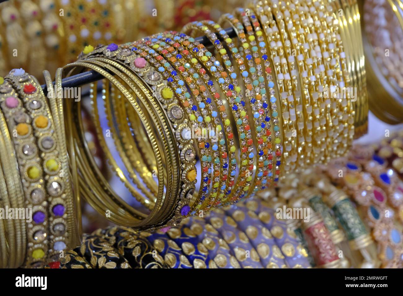 Indian colorful bangles displayed in local shop in a market of Pune ...
