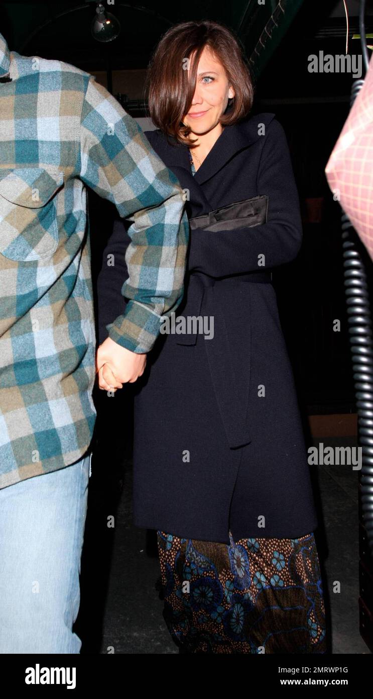 Actress Maggie Gyllenhaal and husband actor Peter Sarsgaard stepped out to Madeo restaurant for a romantic dinner. Los Angeles, CA. 02/15/10.   . Stock Photo