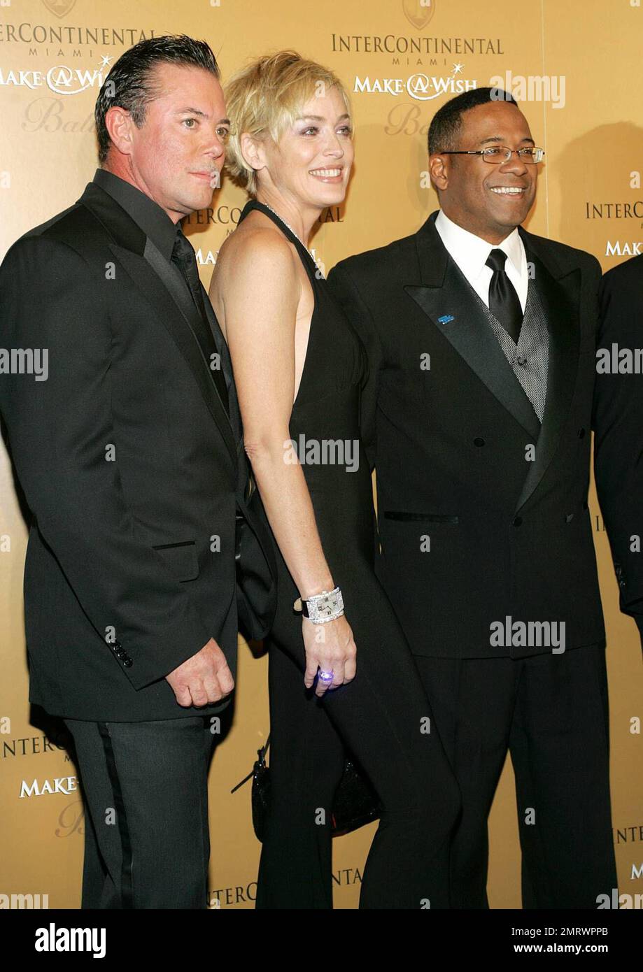 Sharon Stone (C), MakeAWish Foundation CEO Norman Wedderburn (R) and