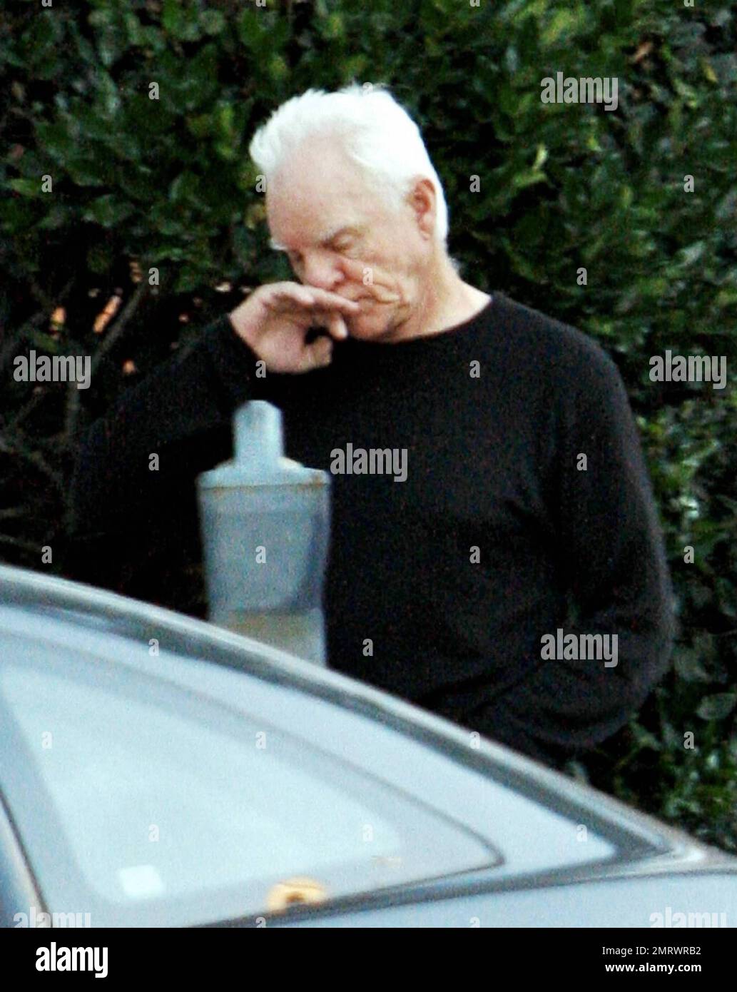 EXCLUSIVE!! Actor Malcolm McDowell along with wife Kelly and son visit an antique and estate jewlery store in Beverly Hills. McDowell went back and forth many times from his car to the store before taking Kelly inside. Los Angeles, CA. 11/17/09. Stock Photo