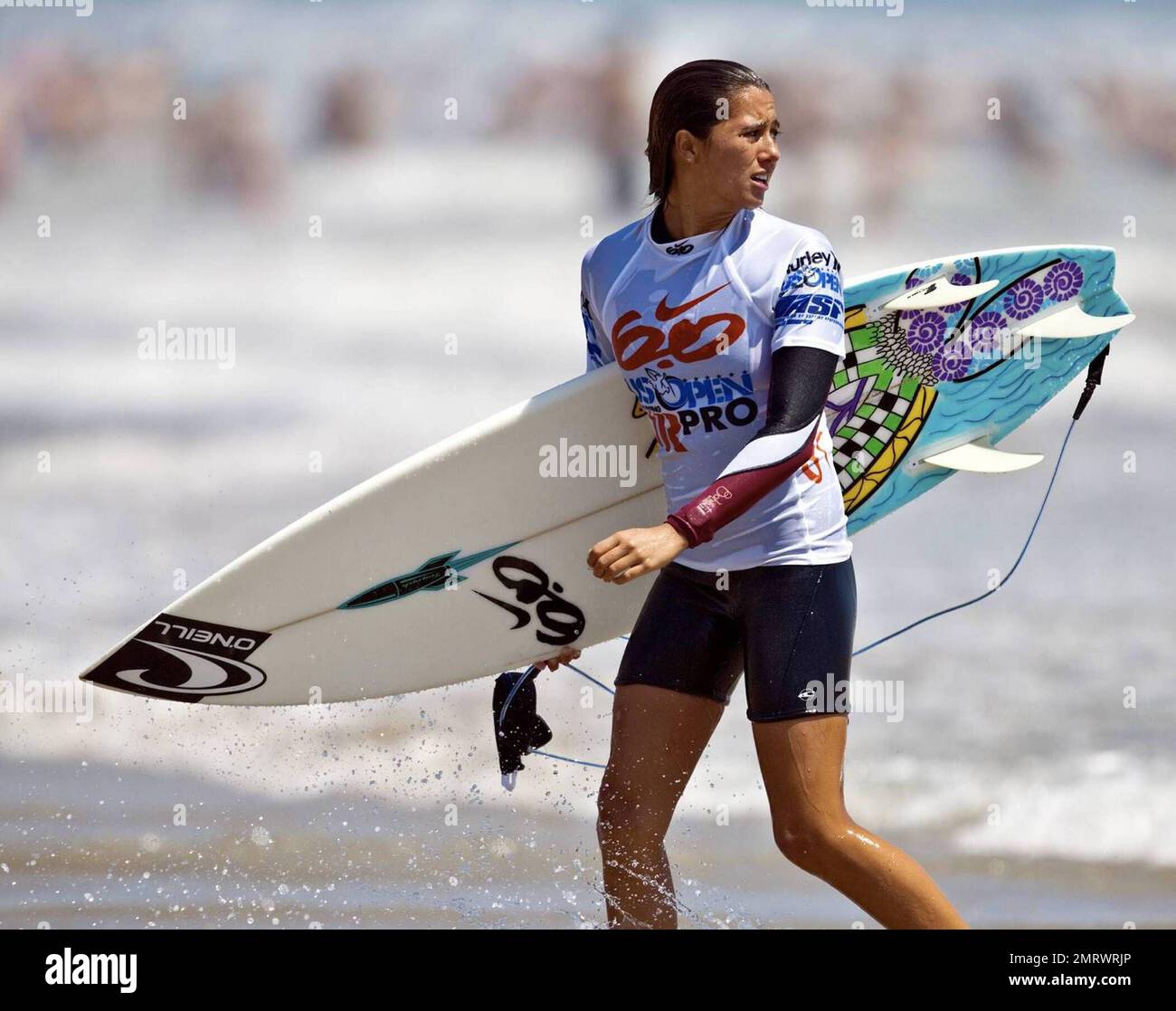 Malia Manuel takes part in the semi-final heat during the Nike 6.0 US Open  of Surfing. Huntington Beach, CA. 7/19/09 Stock Photo - Alamy