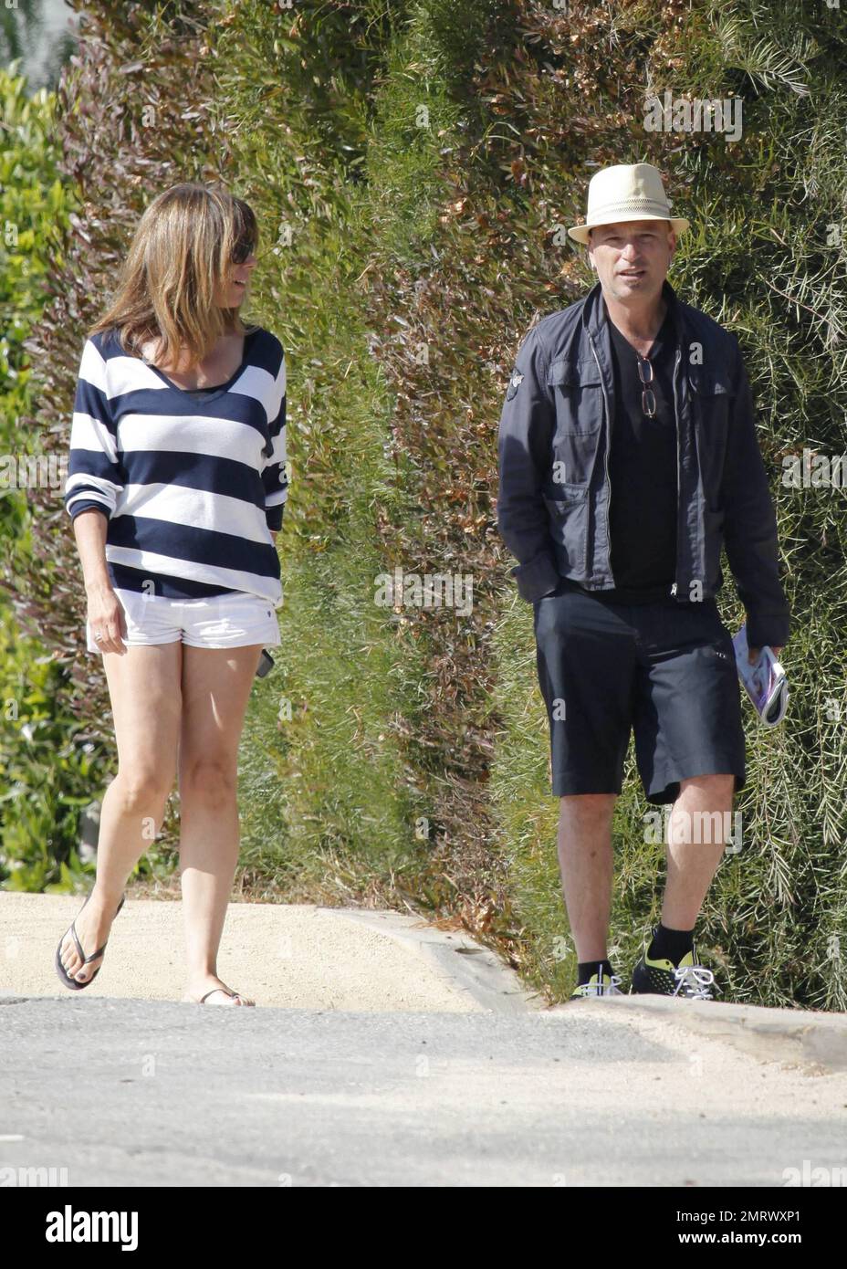 'Deal or No Deal' host Howie Mandel enjoys Labor Day Weekend by taking a stroll with his wife Terry Soil around his Malibu neighborhood. Malibu, CA. 4th September 2011. Stock Photo