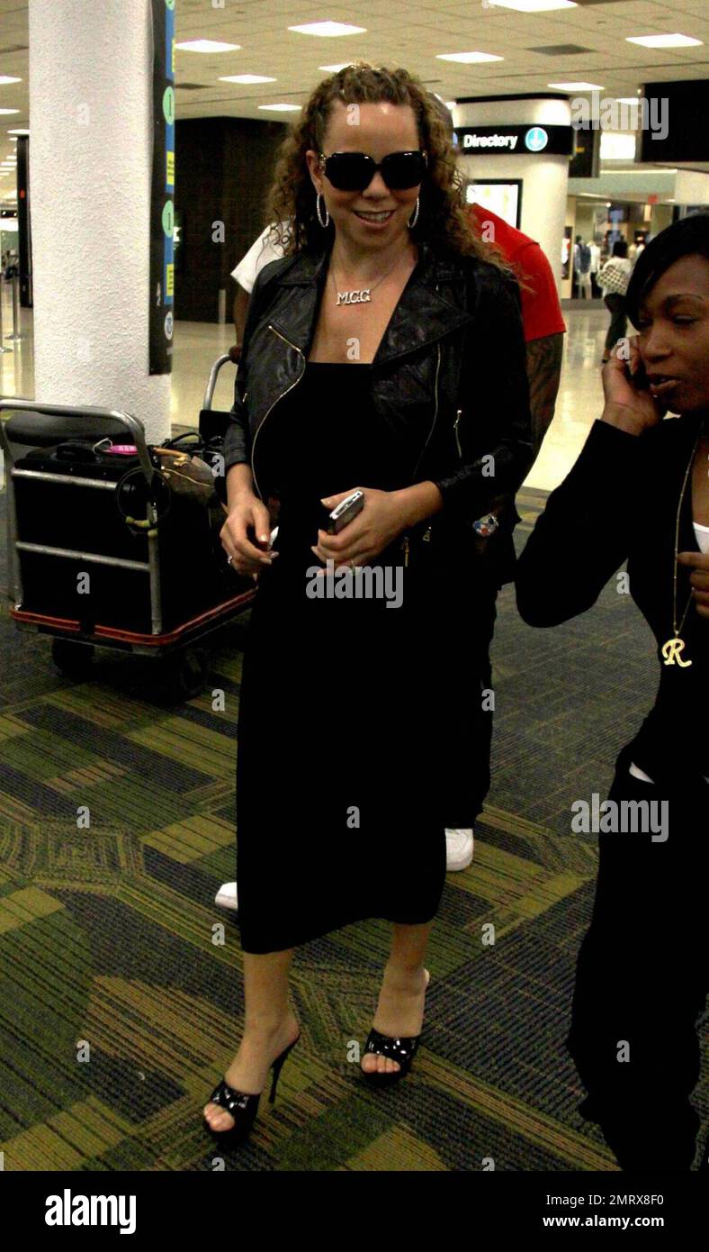 Exclusive!! Mariah Carey arrives at Miami airport following four days with her husband Nick