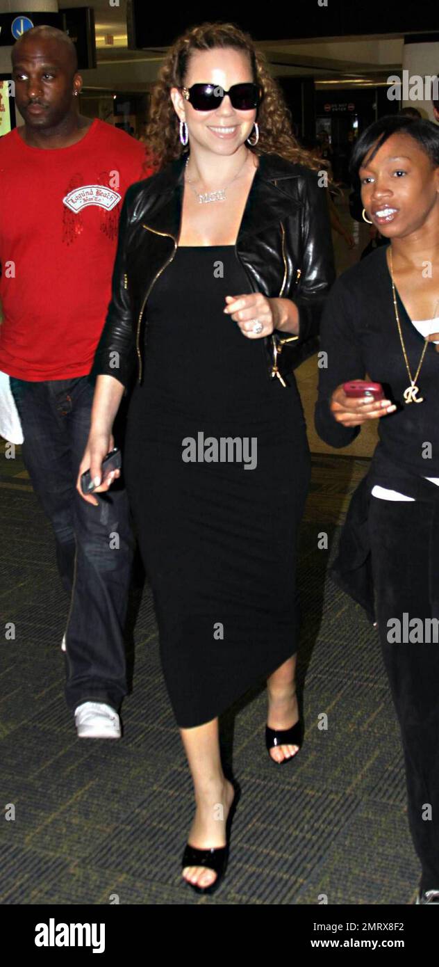 Exclusive!! Mariah Carey arrives at Miami airport following four days with her husband Nick