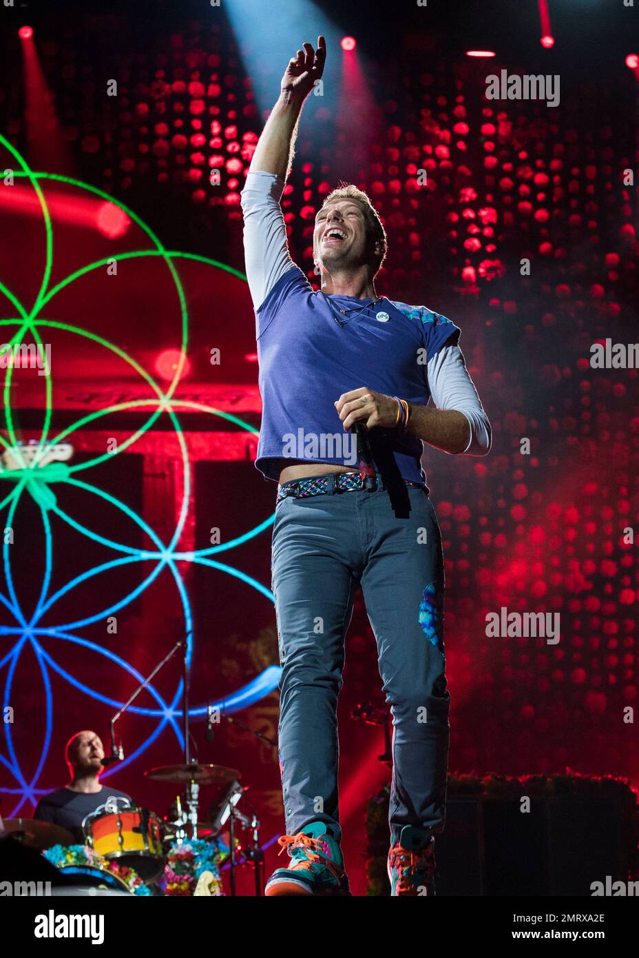 Will Champion of Coldplay performs on stage at Wembley Stadium