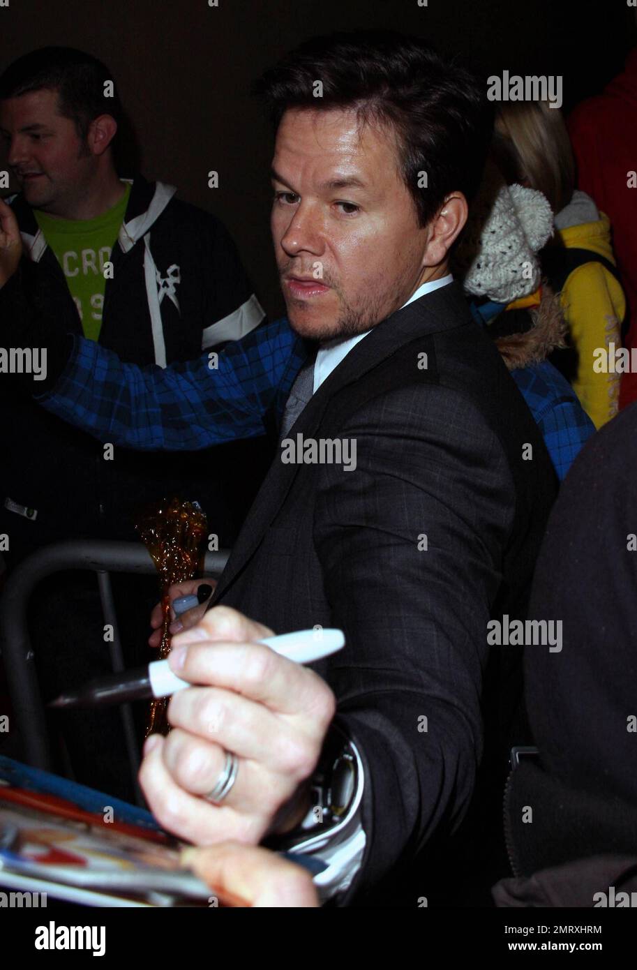 Mark Wahlberg signs autographs for and poses for photos with fans ...