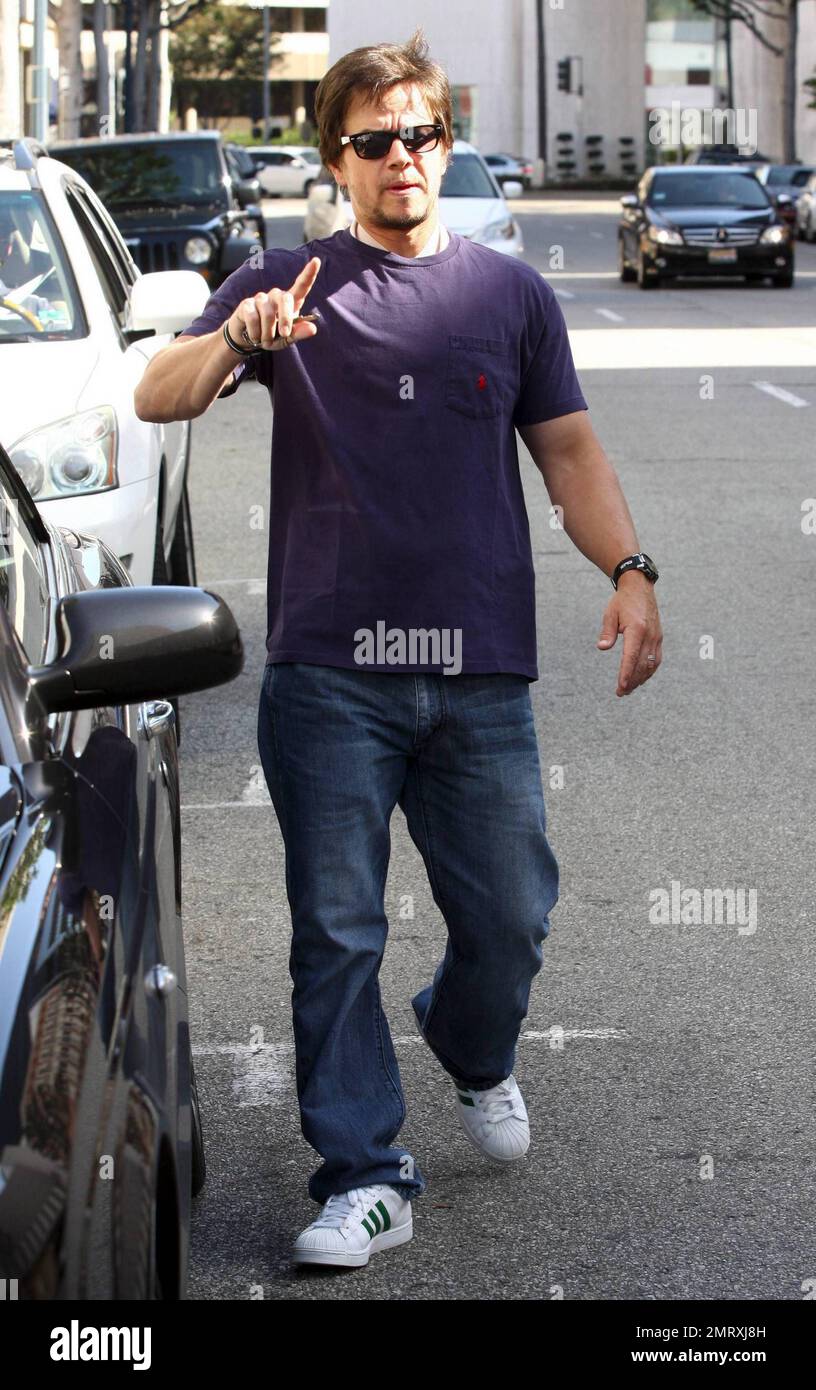 It's reported that Mark Wahlberg, seen here out and about in Beverly Hills,  worries about taking on more 'vulnerable' roles in an effort to impress  childhood friends. According to the reports, Wahlberg,