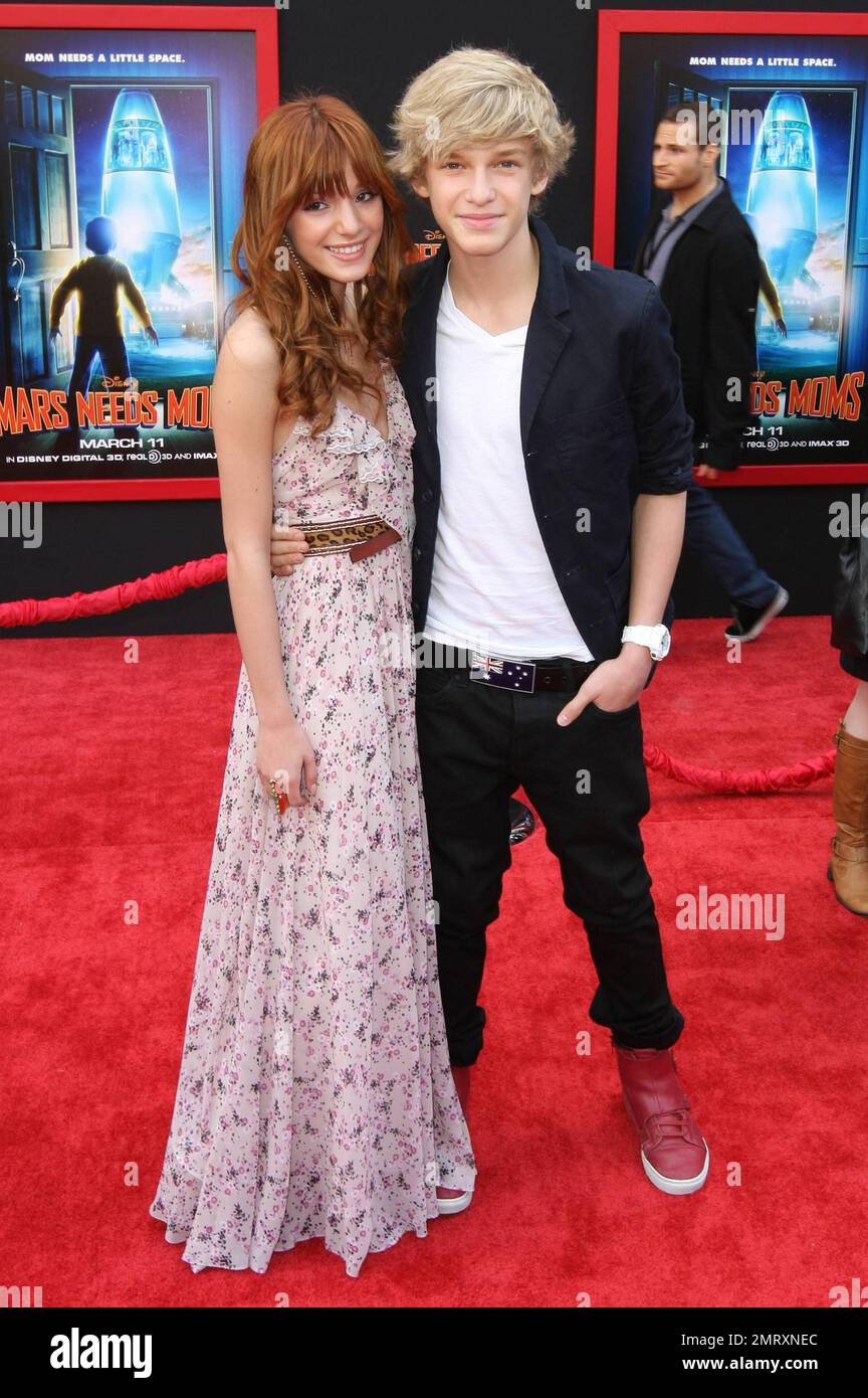 Belle Thorne and Cody Simpson pose for photographers on the red carpet at  the premiere of Walt Disney Pictures 3-D animated film Mars Needs Moms  held at El Capitan Theatre. Los Angeles,