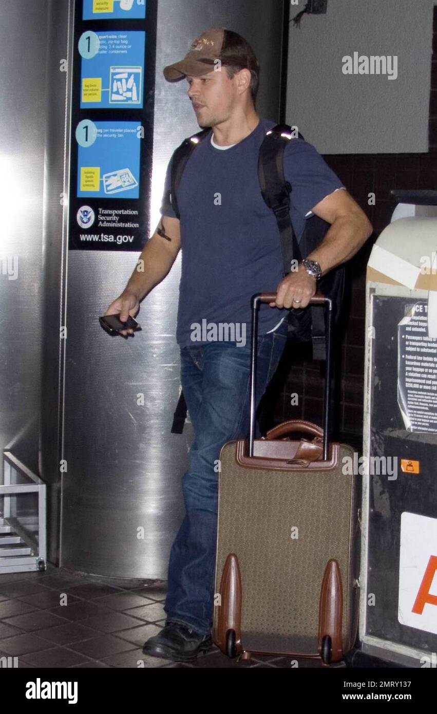 Actor Matt Damon and his wife Luciana arrive at Miami International