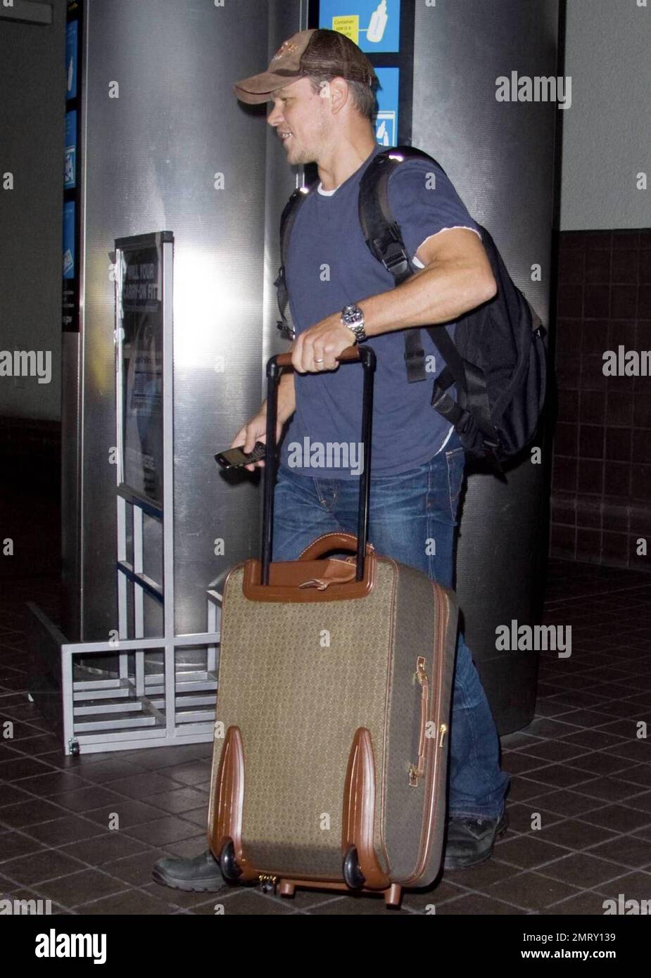 Actor Matt Damon and his wife Luciana arrive at Miami International