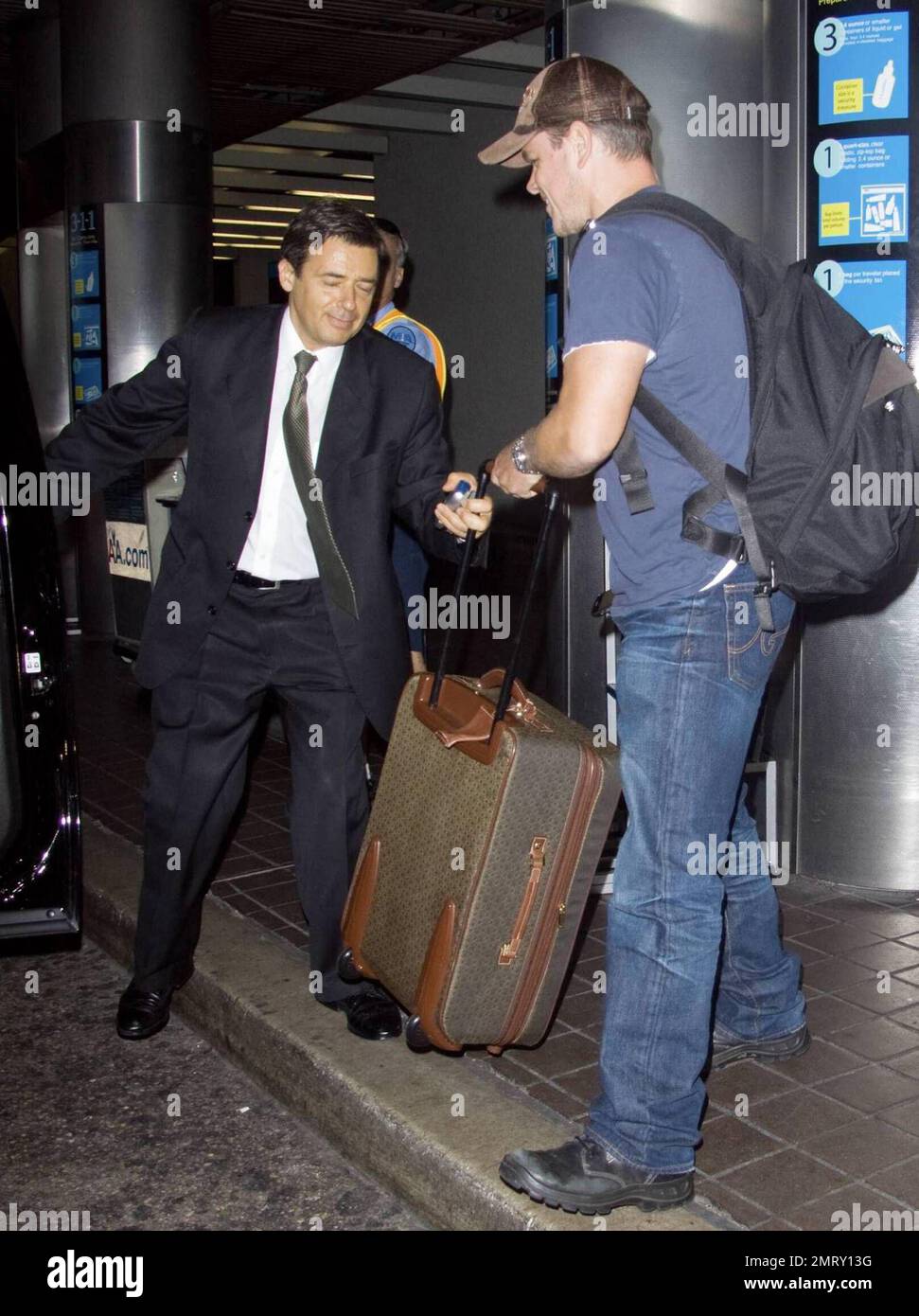 Actor Matt Damon and his wife Luciana arrive at Miami International(00)