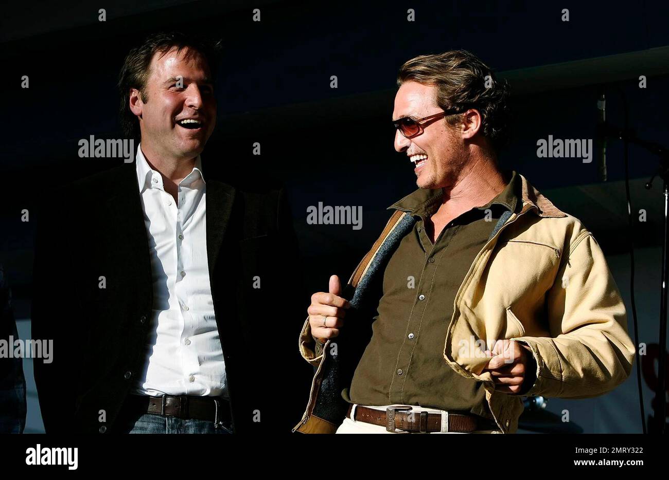 Actor Matthew McConaughey, right, and producer Basil Iwanyk laugh