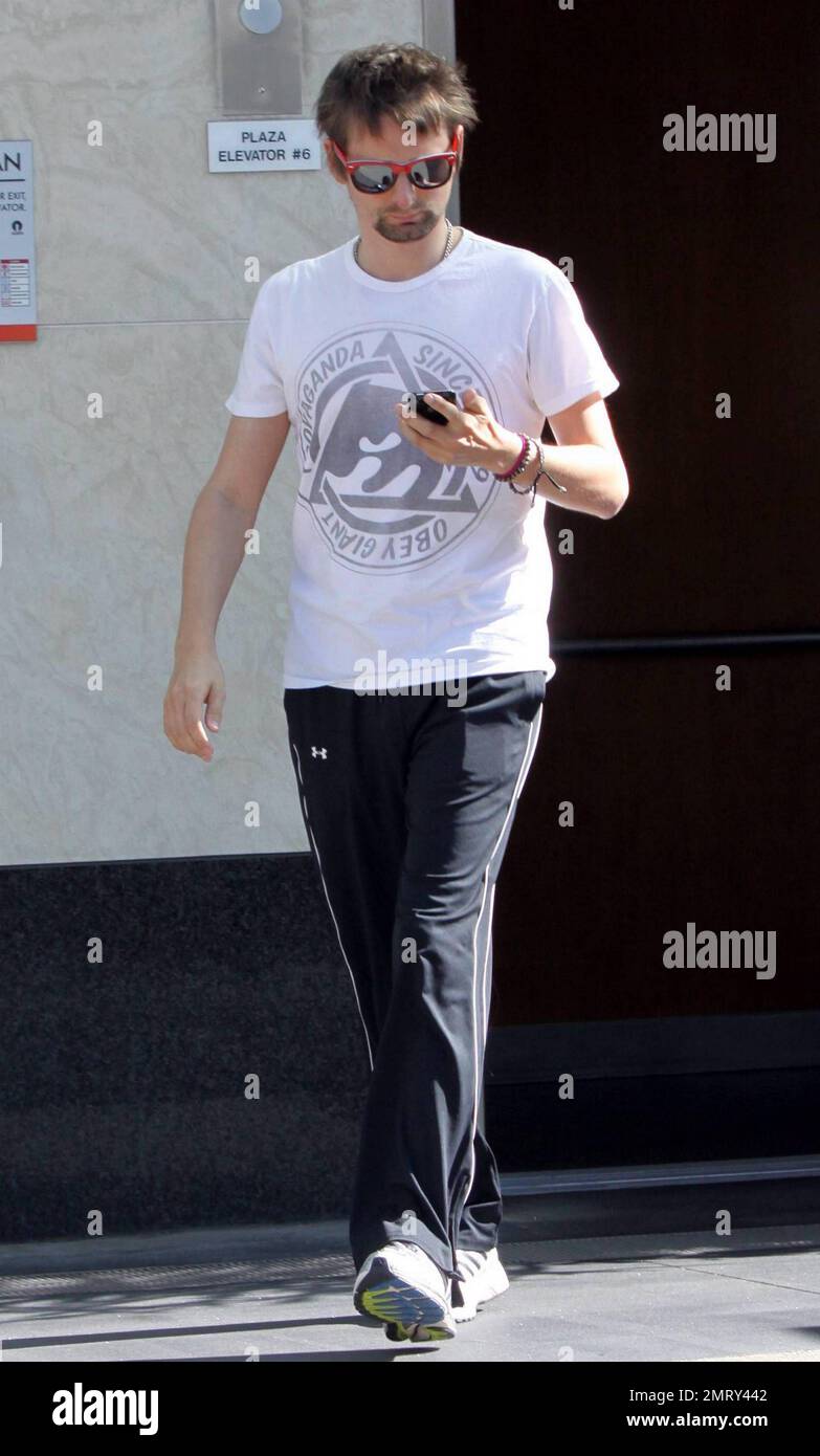 Kate Hudson's boyfriend and guitarist and lead vocalist for the band Muse, Matthew Bellamy strolls casually as he arrives for a workout at a local gym. Matthew and Kate announced last month that they are expecting their first baby together. Kate, who has a son, Ryder, 7, with ex-husband Chris Robinson has been dating Bellamy for about ten months. Los Angeles, CA. 2/17/11. Stock Photo