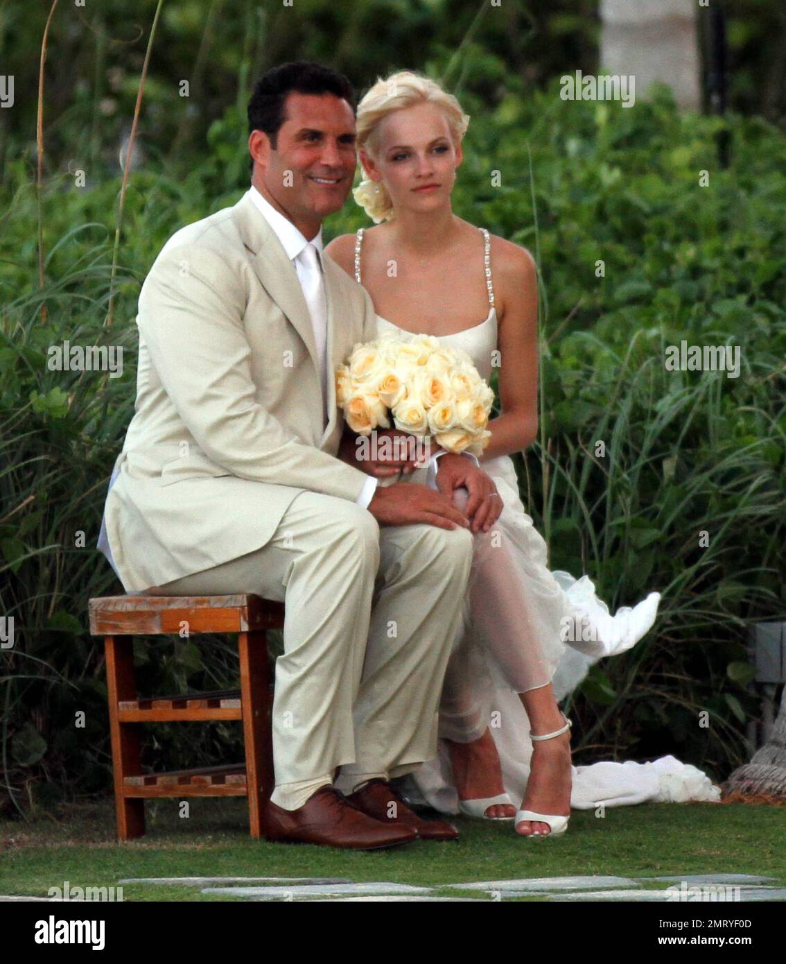 EXCLUSIVE!! Matthew McConaughey and his new bride Camila Alves attended  Latvian model Ginta Lapi a's wedding just one week after they tied the knot  themselves. The couple attended the beachside, sunset wedding, image size:1134x1390