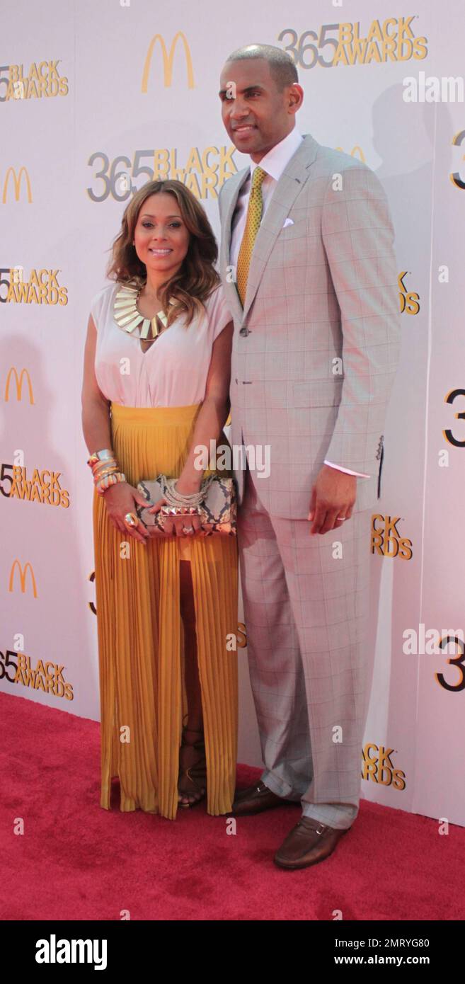 R&B singer Tamia and NBA star husband Grant Hill of the Phoenix Suns (honorees) poses on the red carpet prior to the McDonald's 365 Black Awards held at the Mahalia Jackson Theatre in New Orleans, Louisiana. 6th July 2012. Stock Photo