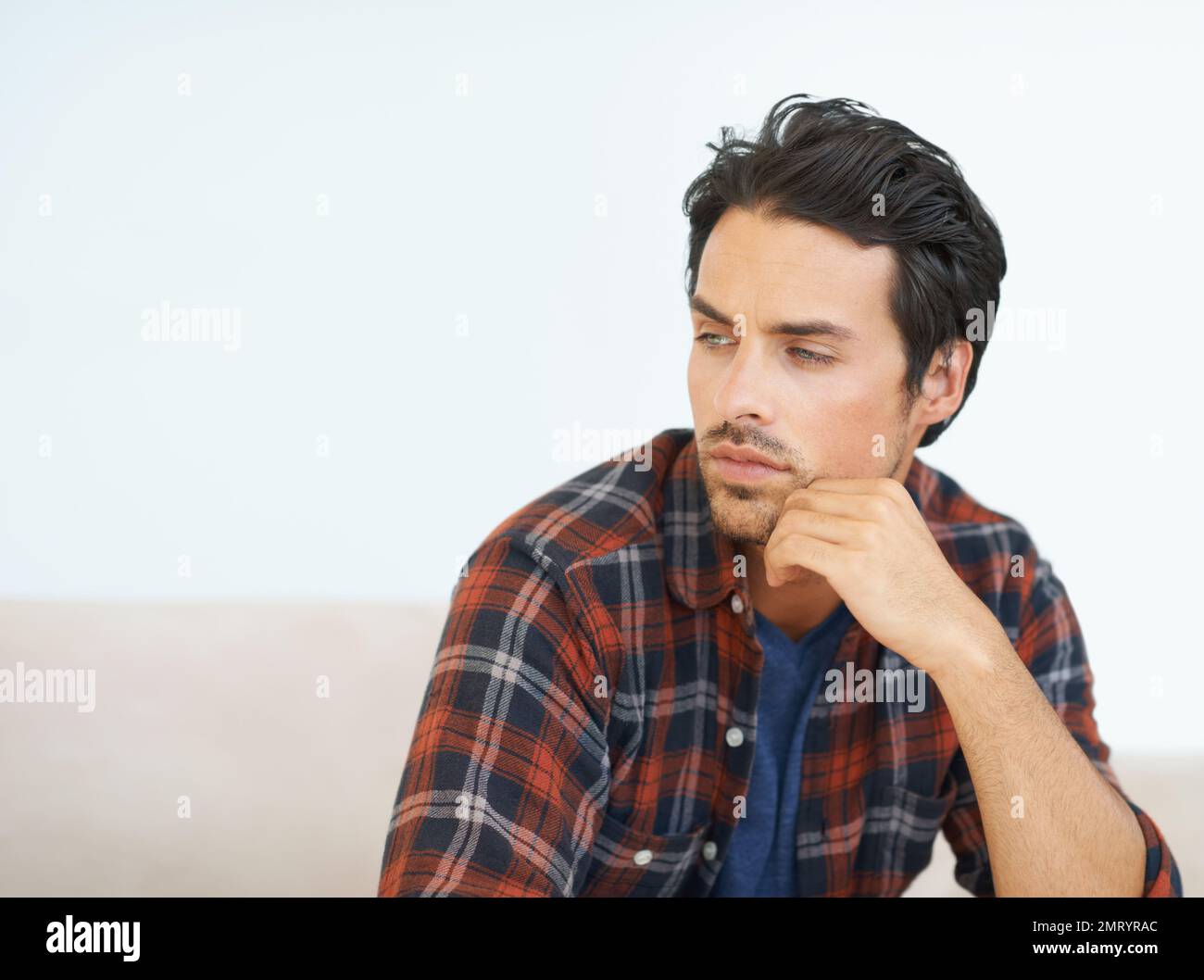 Man sitting head against hand hi-res stock photography and images - Alamy
