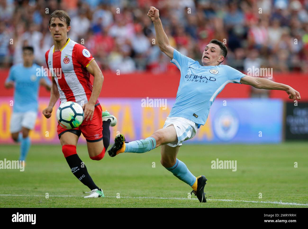 manchester-city-s-phil-foden-right-duels-for-the-ball-during-the