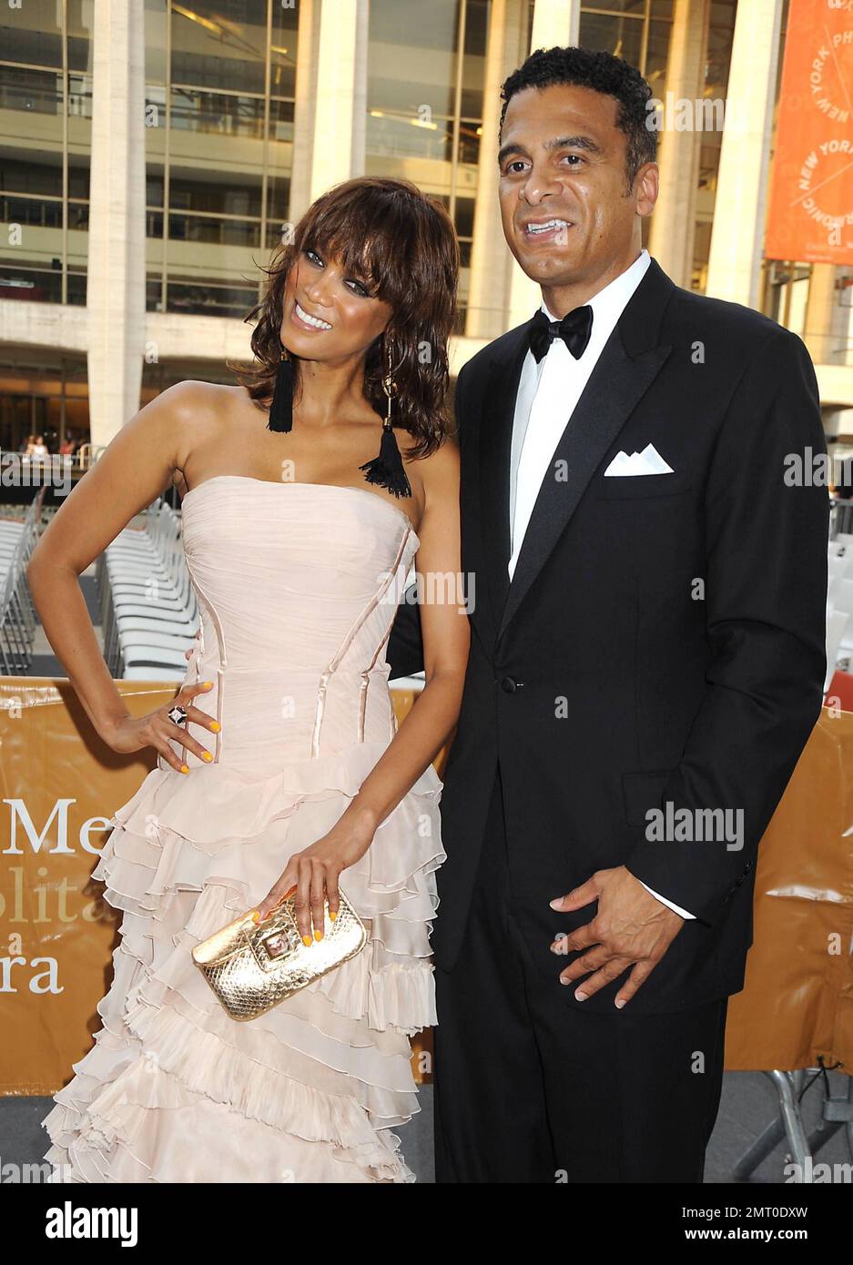 USA CANADA LATIN AMERICA AND GREECE ONLY Tyra Banks in Roberto Cavalli beige dress and boyfrined John O Utendahl attends The Metropolitan Opera Fall Gala Opening Night performance of Anna Bolena