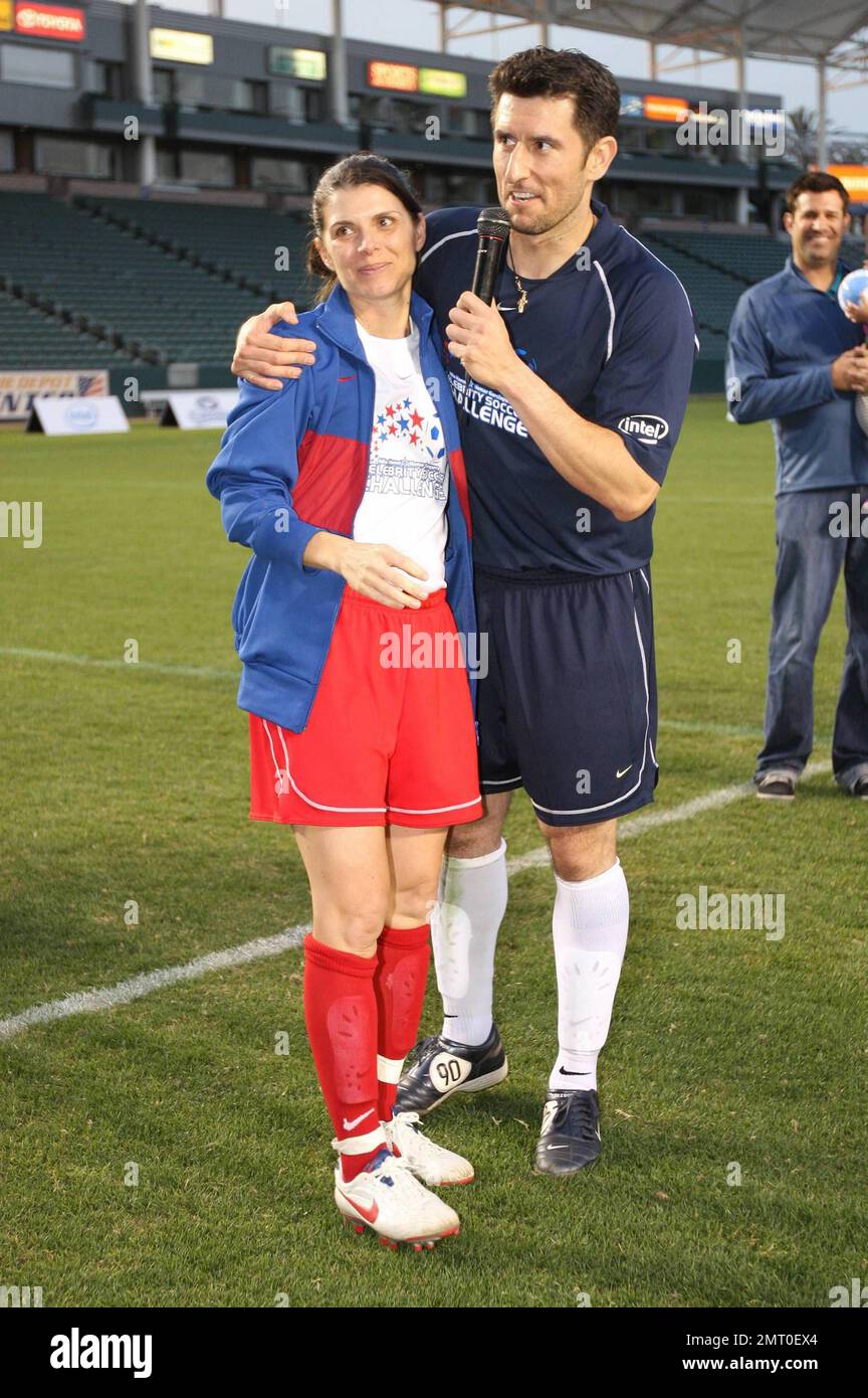 Mia Hamm and Nomar Garciaparra take part in a celebrity soccer