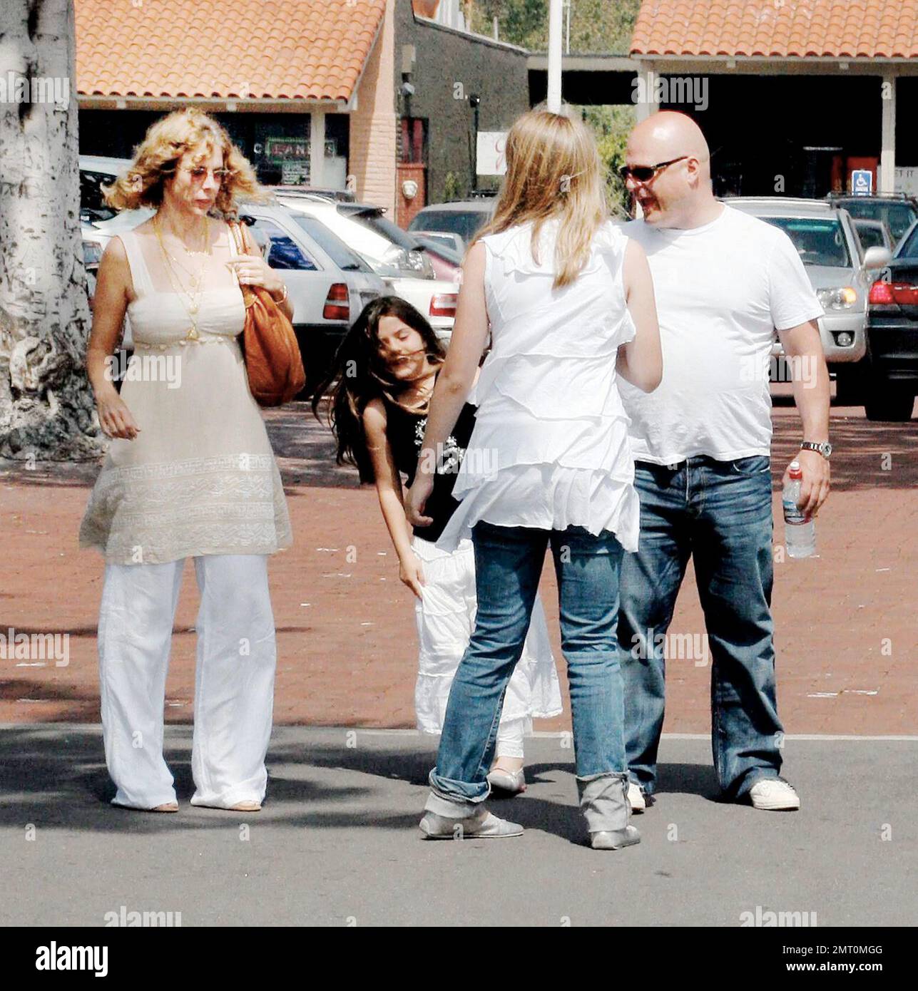 Michael Chiklis spends Mothers Day with his two daughters Autumn and  Odessa and his wife Michelle in Malibu, Ca. Chiklis' youngest daughter Odessa had such a good time, she didn't want to leave come home time and had a tug of war with her dad. 5/14/06 Stock Photo