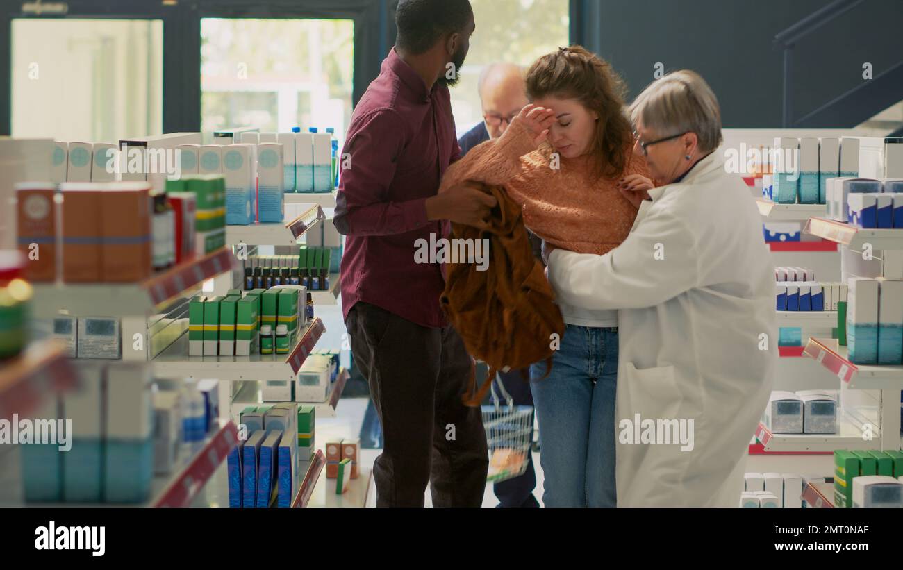 Young adult with spinning sensation and dizziness losing balance in