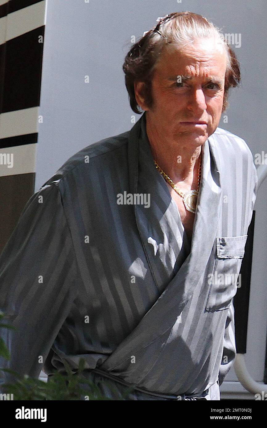 EXCLUSIVE!! Looking very much the character, Michael Douglas wears his hair  pinned back from his face while on the set of "Liberace: Behind the  Candelabra." Douglas, who wore a large gold medallion