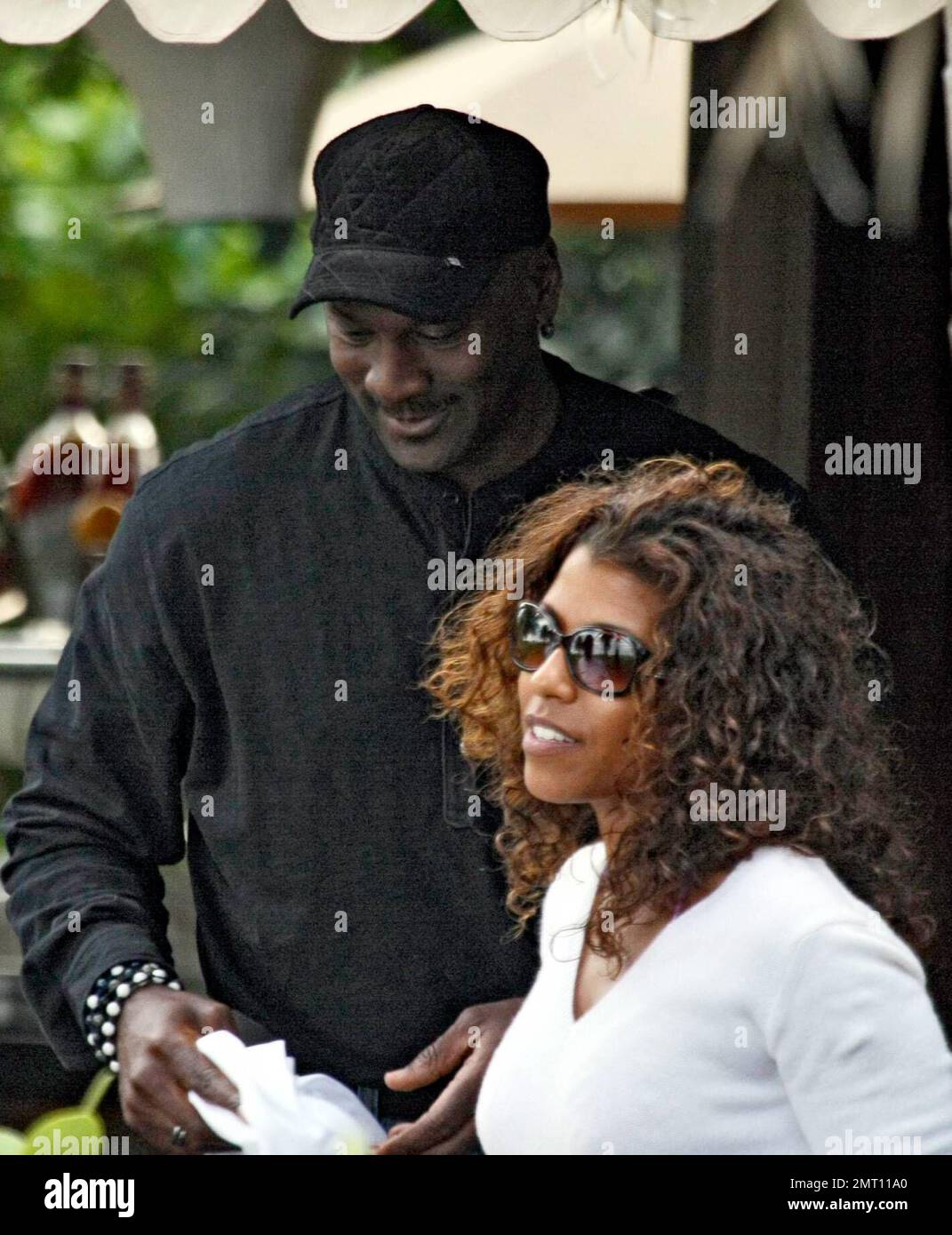 NBA legend Michael Jordan enjoys a refreshing beverage during an