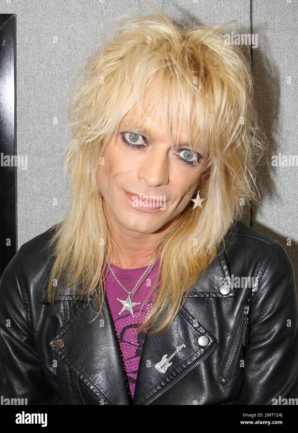 Finnish rock musician Michael Monroe (Matti Fagerholm) poses backstage at the 2010 Download Festival.  With a career spanning three decades the 47-year-old glam rock star has produced six solo albums and several with the band Hanoi Rocks. Derby, UK. 06/12/10. Stock Photo