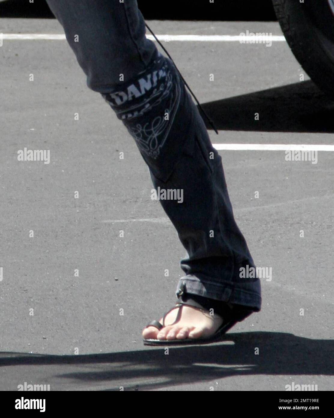Exclusive!! Michelle Rodriguez makes her own fashion statements these days.  The actress was spotted dropping off a bunch of shoes and boots at a custom  design store in Hollywood, Ca. Rodriguez was also wearing a Jack Daniels bandana  around her leg ...