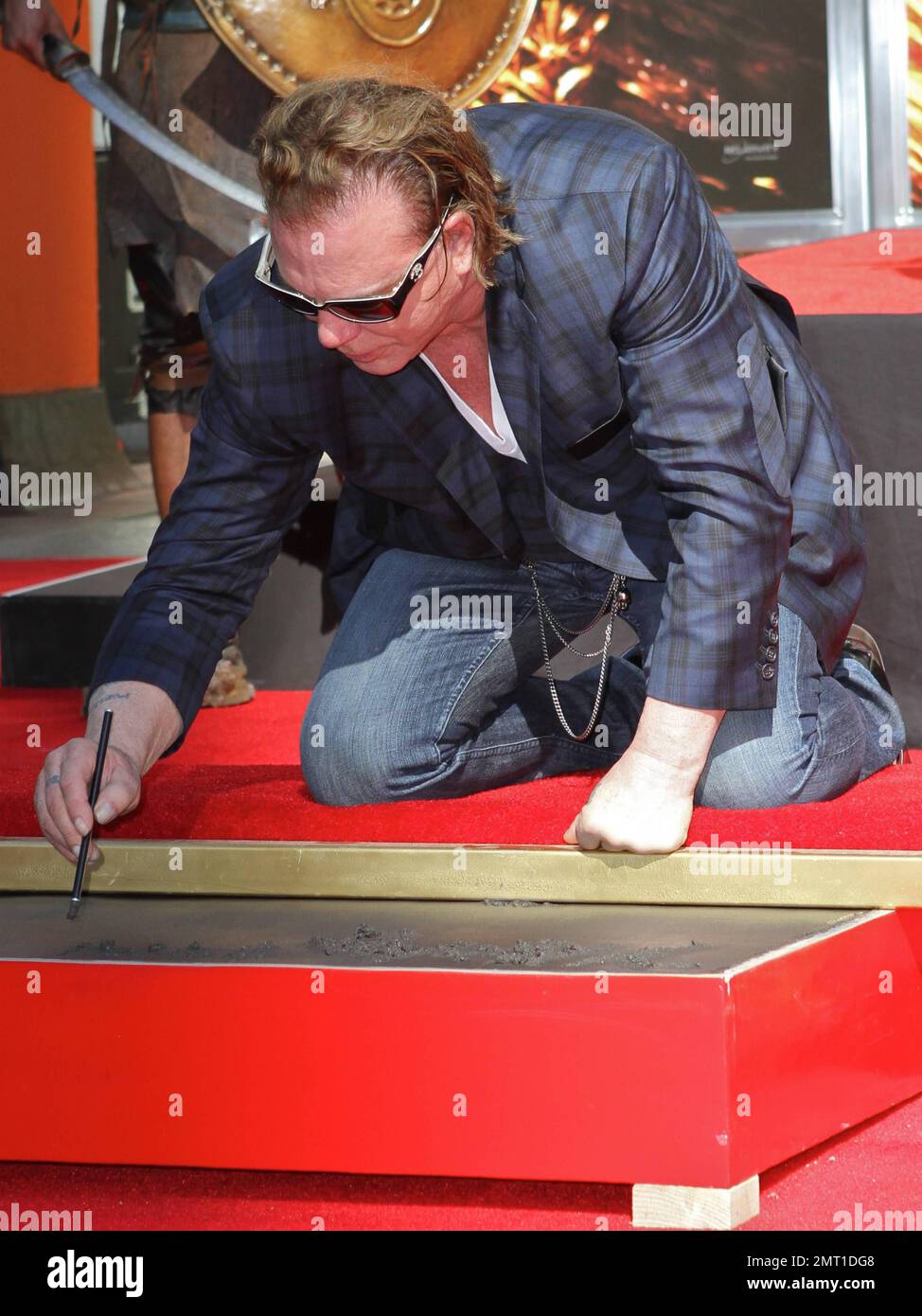 Mickey Rourke Hends Mickey Rourke becomes immortalized at his Hand and Footprint Cermeony ...