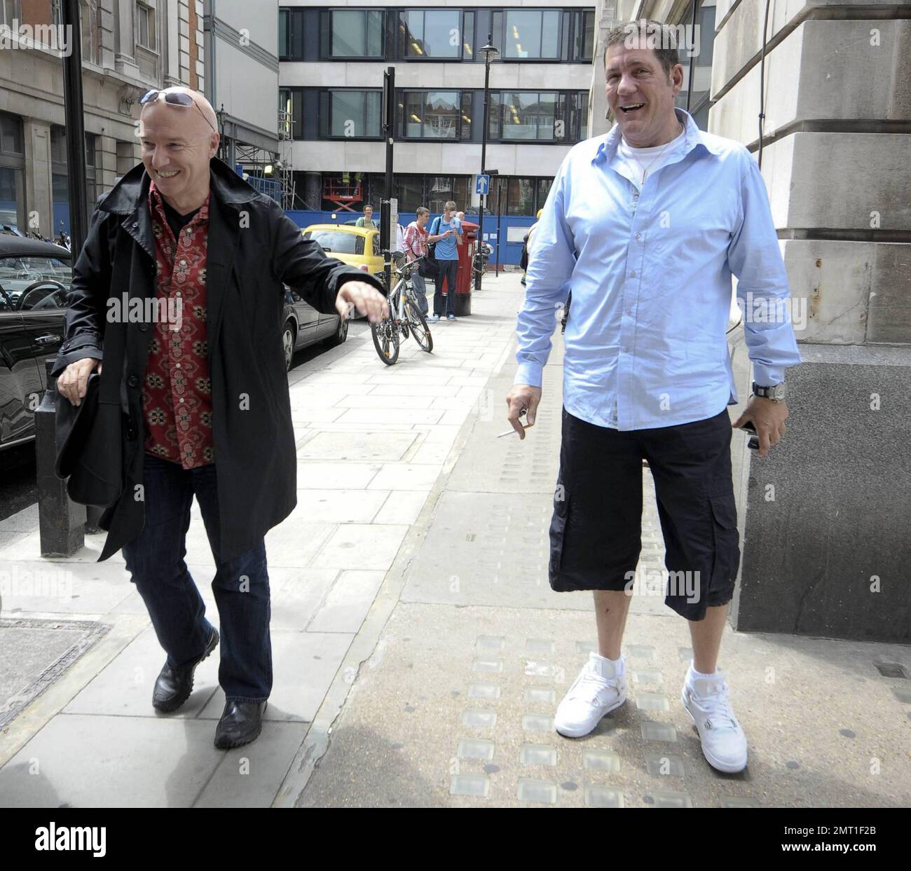 Scottish musician Midge Ure poses for the camera before giving his