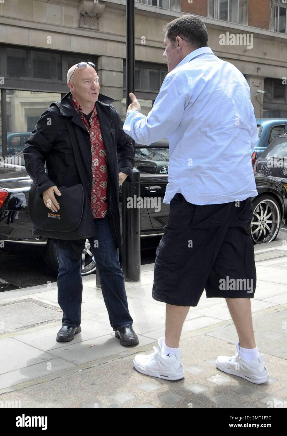 Scottish musician Midge Ure poses for the camera before giving his