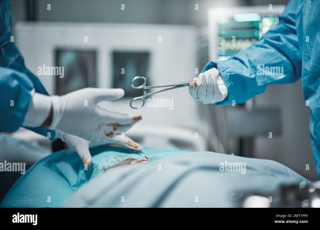 Healthcare, cutting and hands giving scissors during a surgery